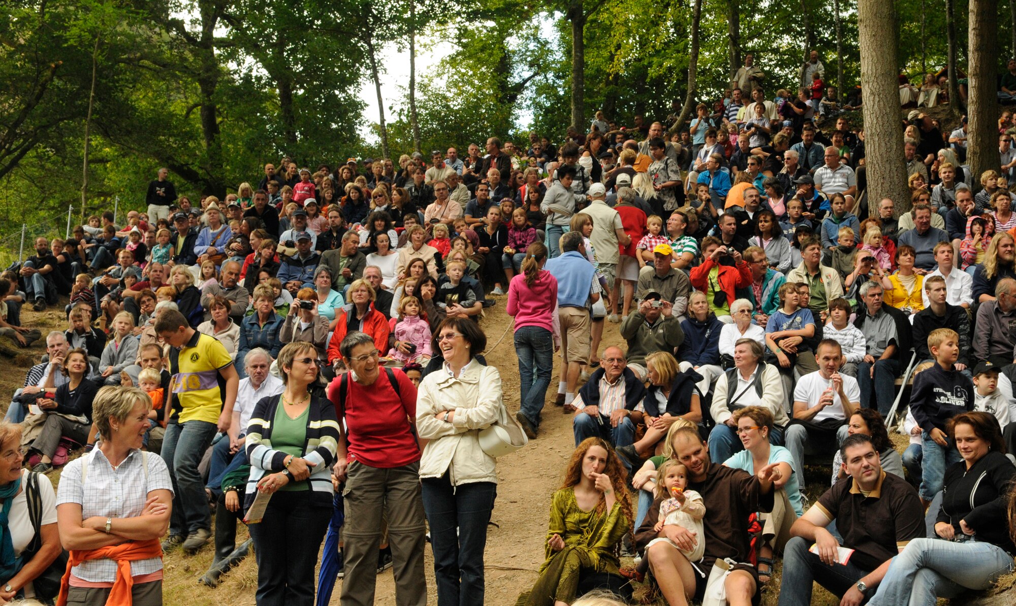 SPANGDAHLEM AIR BASE, Germany – A crowd of spectators watches as actors portraying knights compete in games of skill during the first day of the Medieval Festival in Manderscheid, Germany, Aug. 29. The annual two-day festival included displays of traditional craftsman, sporting events, entertainment and food of the time. (U.S. Air Force photo/Senior Airman Benjamin Wilson)