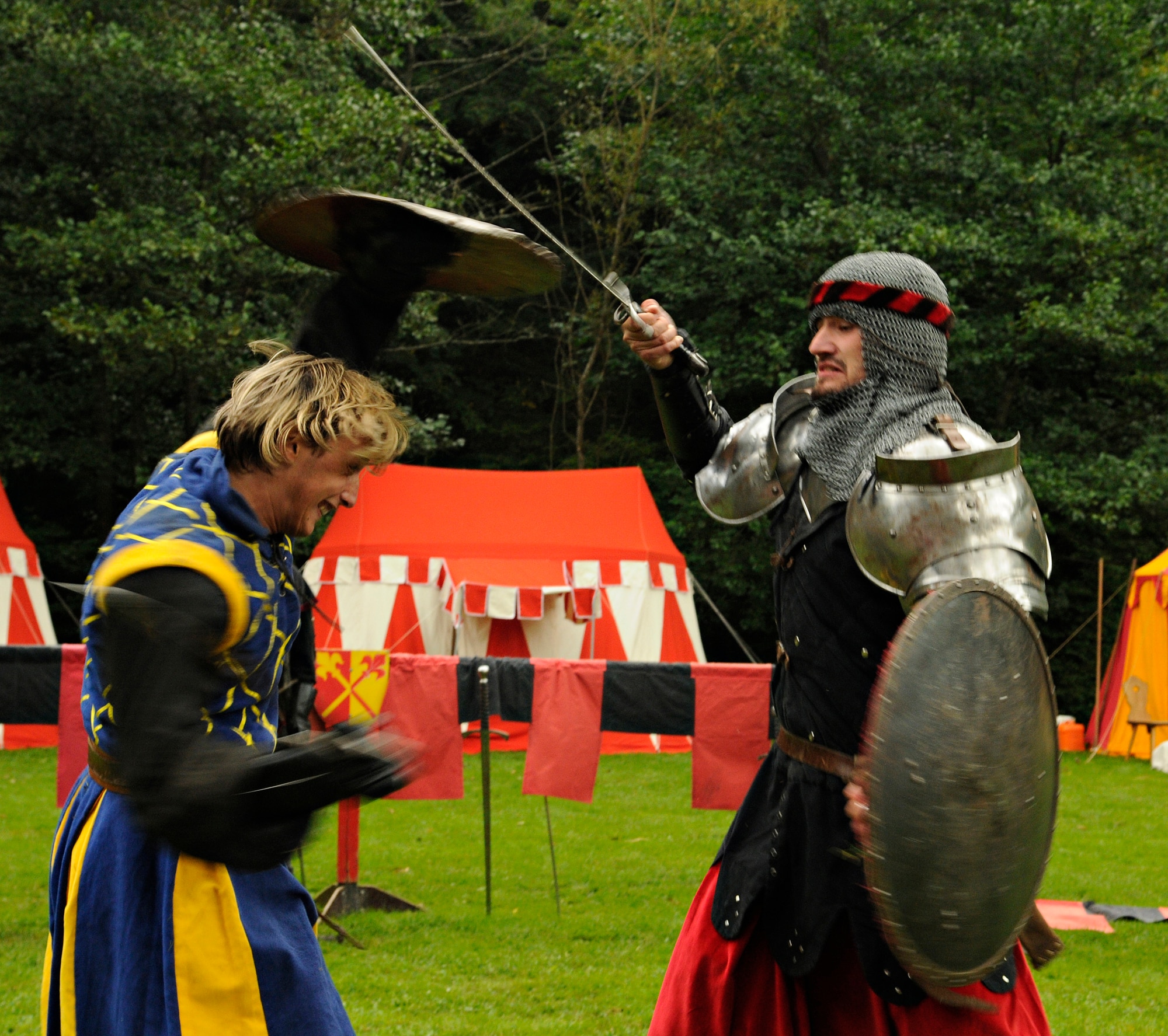SPANGDAHLEM AIR BASE, Germany – Two actors dressed as knights engage in mortal combat during the first day of the Medieval Festival in Manderscheid, Germany, Aug. 29. The annual two-day festival included displays of traditional craftsman, sporting events, entertainment and food of the time. (U.S. Air Force photo/Senior Airman Benjamin Wilson)
