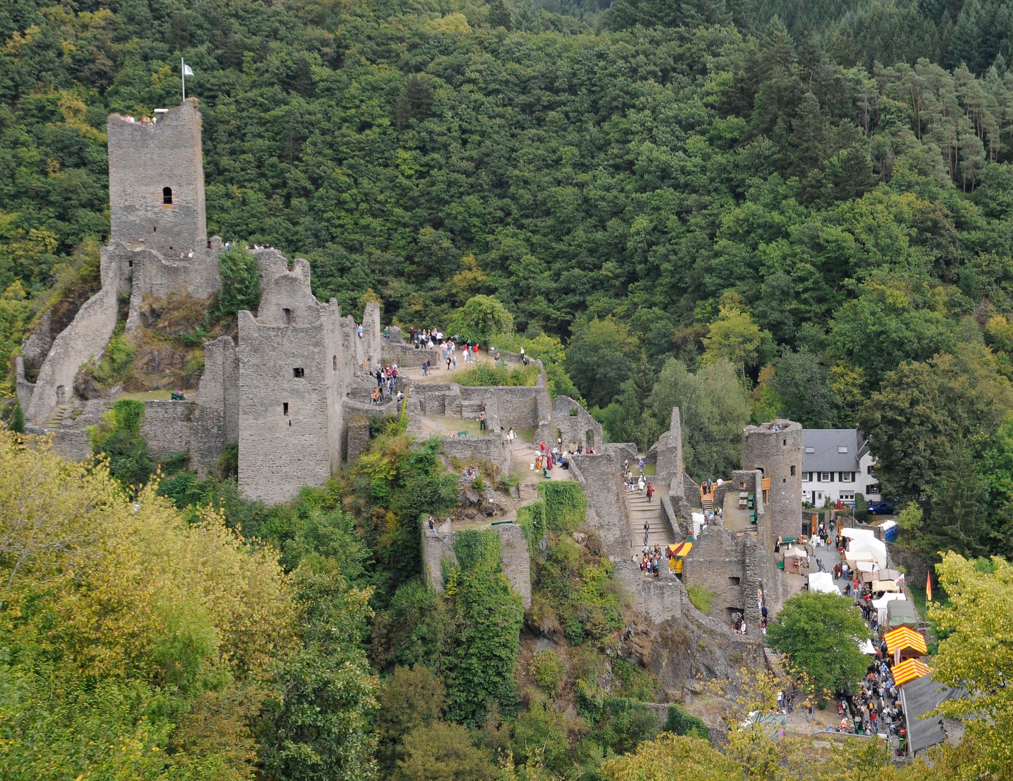 SPANGDAHLEM AIR BASE, Germany – Festival goers and participants climb a castle in Manderscheid, Germany, during the first day of the Medieval Festival Aug. 29. The annual two-day festival included displays of traditional craftsman, sporting events, entertainment and food of the time. (U.S. Air Force photo/Senior Airman Benjamin Wilson)