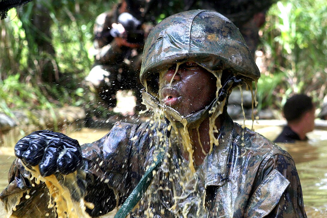 U.S. Marines participate in combat exercises at the Jungle Warefare Training Center on Camp Gonsalves, Okinawa, Japan, Aug. 21, 2009.
