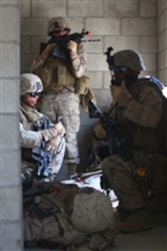 U.S. Marines with Military Police Company, Headquarters Battalion, 1st Marine Division prepare to evacuate mock casualties during a training exercise at San Mateo on Camp Pendleton, Calif., on Aug. 13, 2009.  The Marines train for different scenarios in order to be combat-ready at all times.  