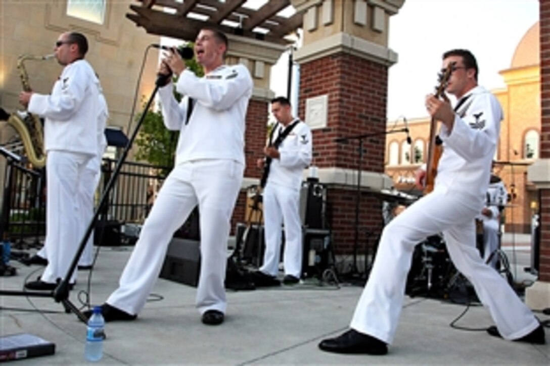 The U.S. Navy Band, Horizon, performs at Shadow Lake Towne Center, one of many performances during Omaha Navy Week, in Papillion, Neb., Aug, 27, 2009. Navy Weeks are designed to show Americans the investment they have made in their Navy and increase awareness in cities that do not have a significant Navy presence.