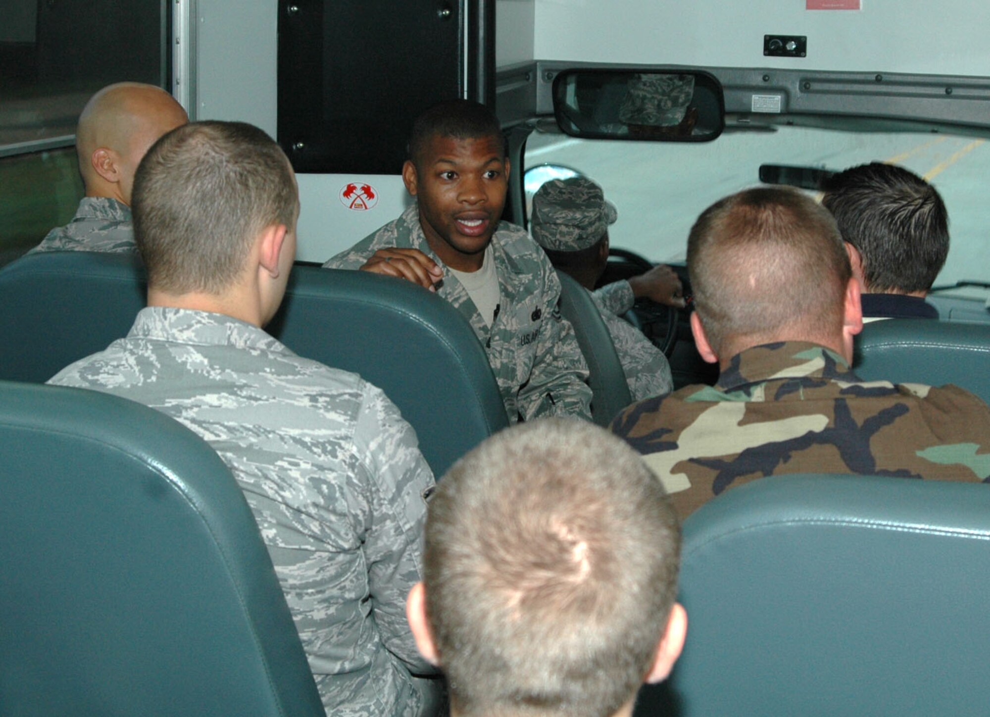Tech. Sgt. Patrick Washington, a military equal opportunity advisor for the 917th Wing, Barksdale Air Force Base, La., acts as a guide for a base tour set up for the in-coming Airmen who are new to the unit November 8, 2009. The shoppette, commissary and movie theater were among the many spots pointed out to the group of Airmen and ended at the dining facility on Barksdale where the group met up with senior staff members for a welcome breakfast. (U.S. Air Force photo/Senior Airman Crystal Jordan)