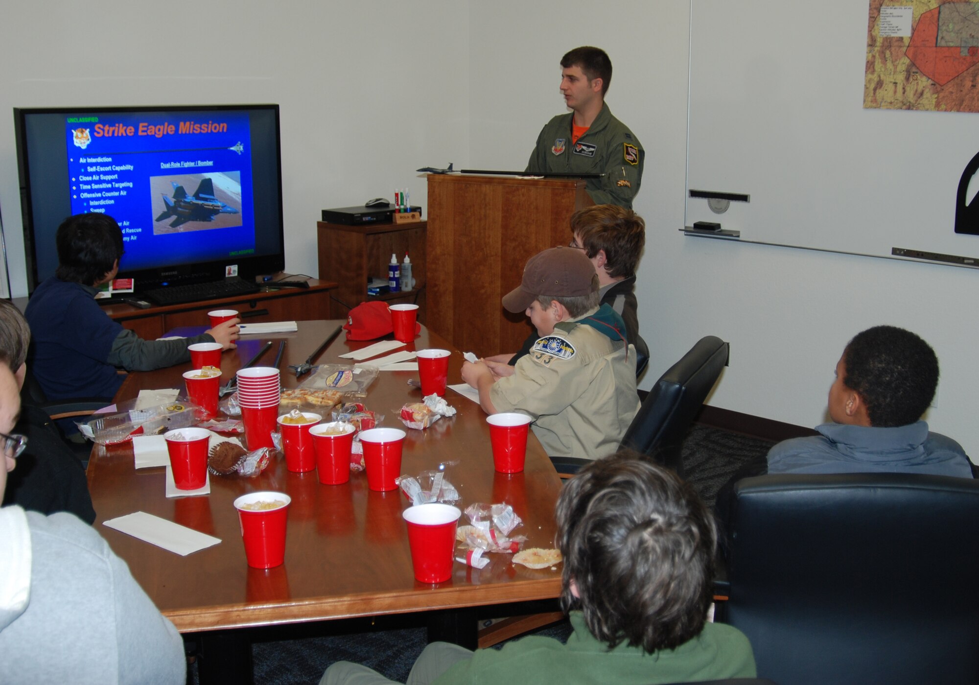 MOUNTAIN HOME AIR FORCE BASE, Idaho -- Capt. Jim Harris, 391st Fighter Squadron pilot, gives an F-15 capability briefing to Boy Scouts from Boise troop 33 during a base tour Nov. 21. (U.S. Air Force photo by Maj. Mark Schmidt)