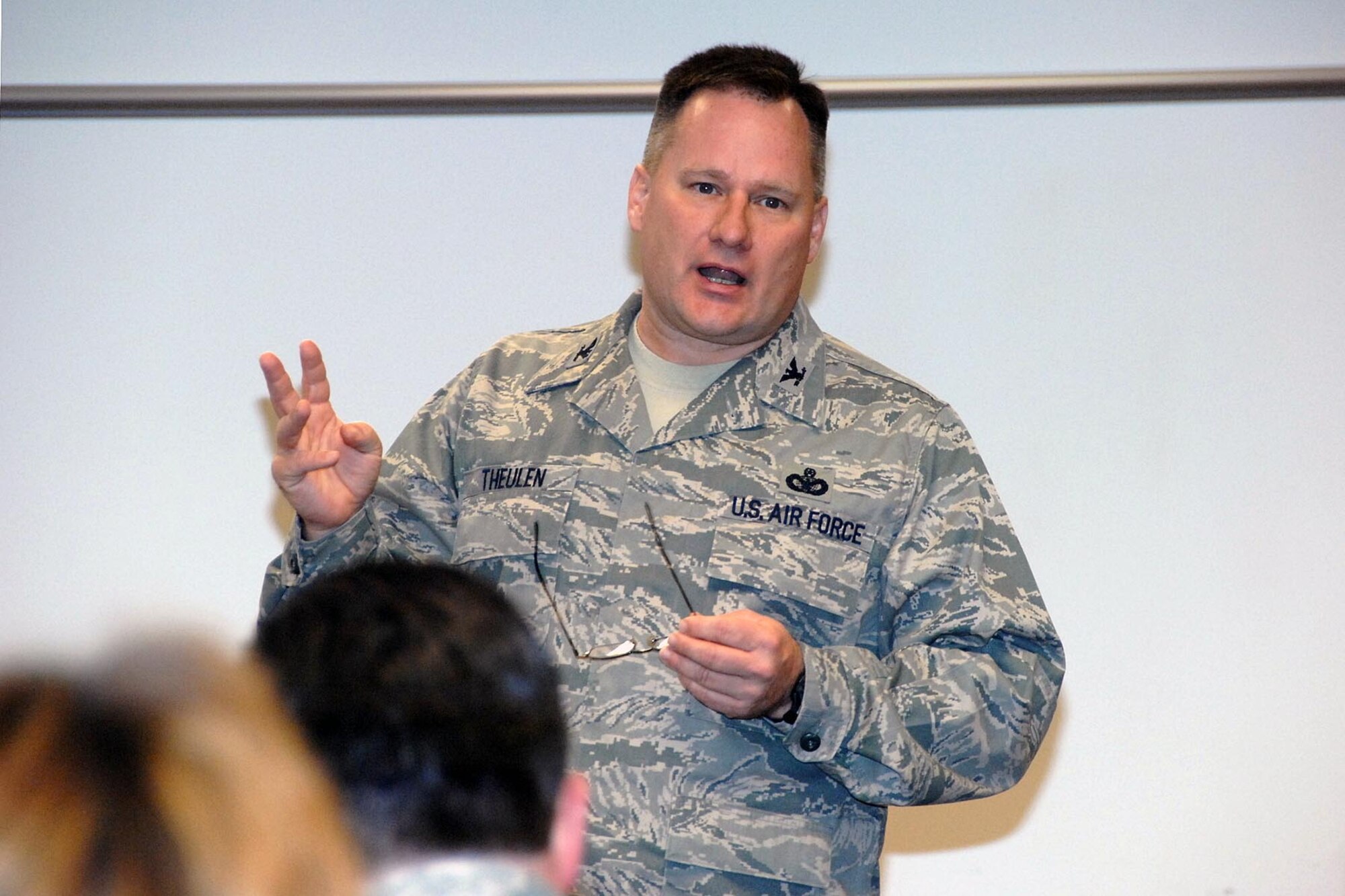 OFFUTT AIR FORCE BASE, Neb. - Col. Jeff Theulen, 1st Air Force emergency preparedness liason officer, presents the Defense Support for Civil Authorities Briefing Nov. 24 at the Bellevue Public Schools Support Center in Bellevue, Neb. The briefing explained how Department of Defense agencies are able to support civilian agencies during a natrual disaster or crisis situation. U.S. Air Force Photo by Kendra Williams