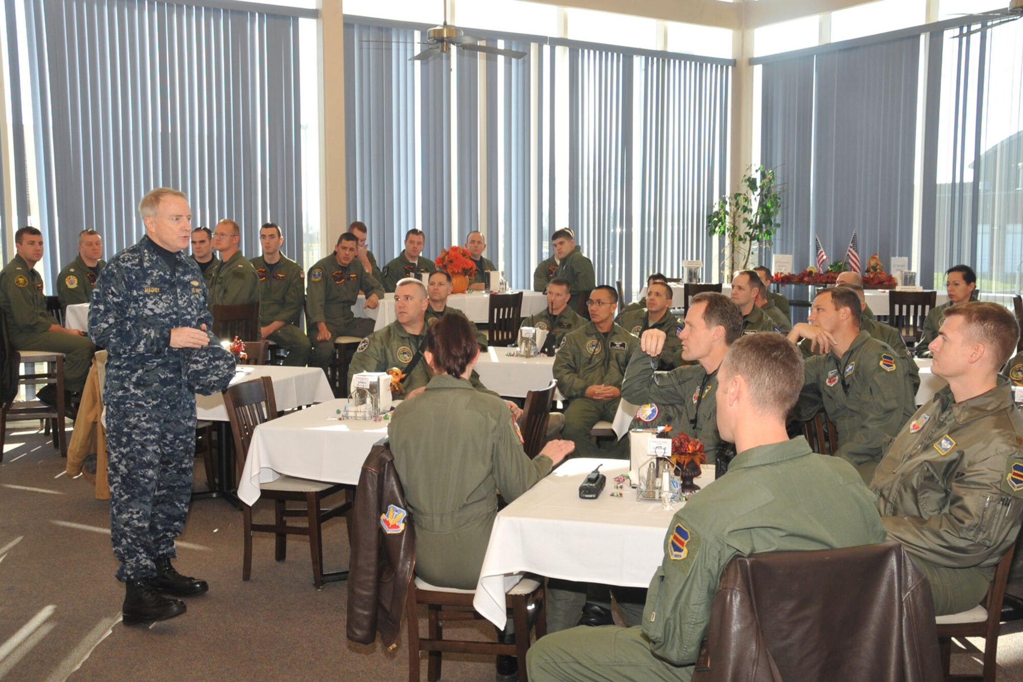 OFFUTT AIR FORCE BASE, Neb. - Vice Adm. Carl V. Mauney, U.S. Strategic Command vice commander,  addresses U.S. Navy and Air Force Alert Crew members Nov. 26 at the Campisi Alert Dining Faciliy, during the facility's Thanksgiving dinner. Admiral Mauney and 55th Wing senior leaders served meals to members of Team Offutt to thank them for their service. U.S. Air Force Photo by Stephen Cunningham
