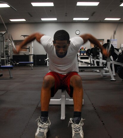 Airman 1st Class Randall Montgomery performs cable chest presses at the Fitness and Sports Center here Nov. 30. Airman Montgomery put the extra protein he ate from the three differently cooked turkeys he enjoyed with his family to good use during his strength training workout after Thanksgiving. Airman Montgomery is an aerospace ground equipment apprentice with the 437th Maintenance Squadron. (U.S. Air Force photo/Staff Sgt. Daniel Bowles)