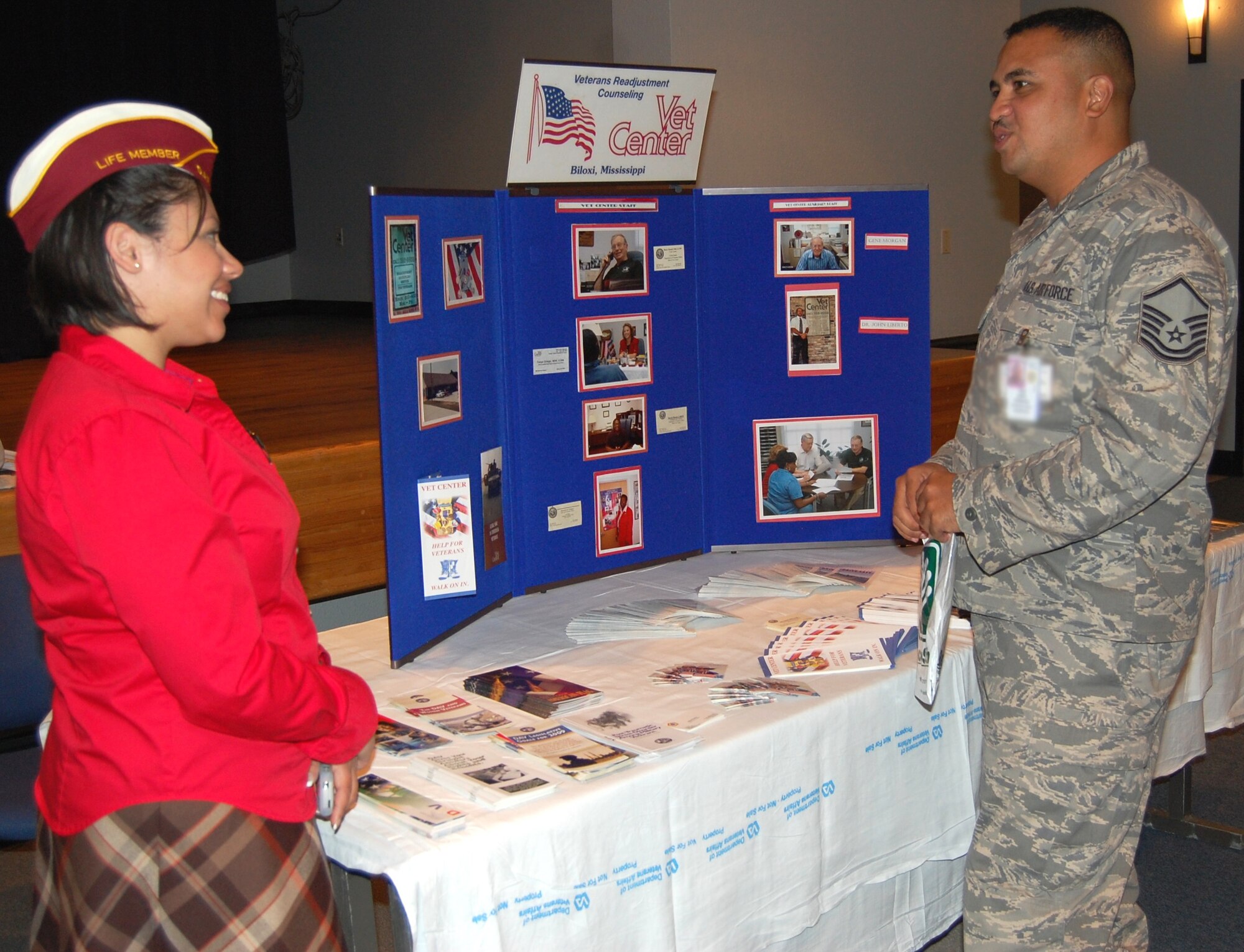 Naomi Kraina, Keesler Disabled American Veterans representative, discusses veterans’ benefits with Master Sgt. Lerry Forester, 81st Medical Support Squadron, during Warrior Care Month Outreach Day Nov. 19.  The event, held in Keesler Medical Center’s Don Wylie auditorium, included representatives from Keesler and other organizations who offered information about the services they provide veterans.  (U.S. Air Force photo by Steve Pivnick)