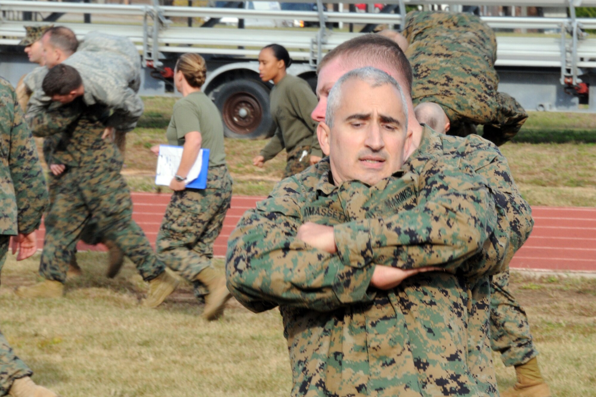 Marines from the 33d Fighter Wing and Airmen from across Eglin take part in the Marines’ Combat Fitness Test Nov. 25 here. Airmen were invited to participate by the Marines who were testing as part of their annual fitness program. (Air Force photo/  Staff Sgt. Bryan Franks)