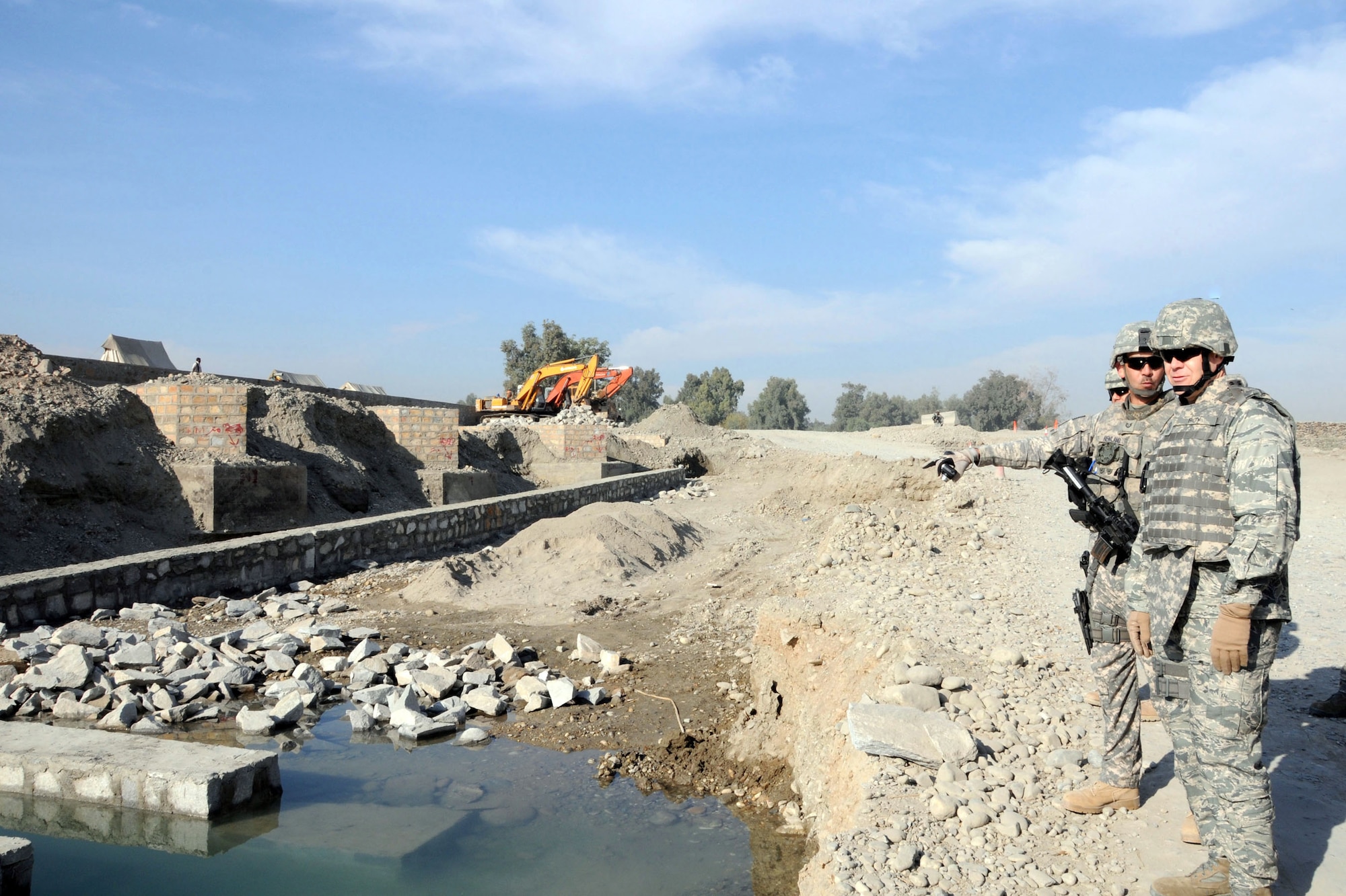 Chief Master Sgt. of the Air Force James A. Roy (right), speaks with Staff Sgt. Joshua Morrissette at the Air Force-led Nangahar Provincial Reconstruction Team Nov. 28, 2009, in Jalalabad, Afghanistan. Sergeant Morrissette is assigned to the 2nd Brigade Embedded Training Team deployed from the 96th Logistics Readiness Squadron at Eglin Air Force Base, Fla. (U.S. Air Force photo/Tech. Sgt. Brian Boisvert) 