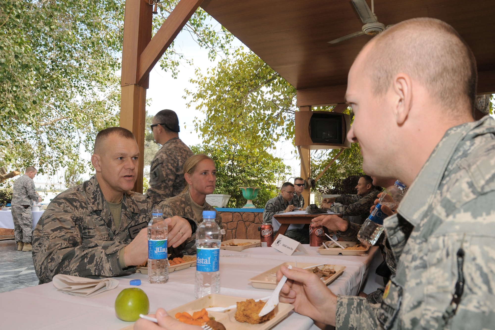 Chief Master Sgt. of the Air Force James A. Roy listens to Tech. Sgt. Shawn Newland about ongoing construction of the Saracha Bridge Nov. 28, 2009, in Jalalabad, Afghanistan. Sergeant Newland is the Nangarhar Provincial Reconstruction Team project manager deployed from the 99th Civil Engineer Squadron at Nellis Air Force Base, Nev. (U.S. Air Force photo/Tech. Sgt. Brian Boisvert)