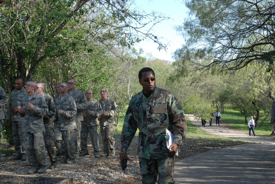 Members of the 2009 Distinguished Educator Tour viewed elements of basic military training, beginning with a briefing. The BMT tour included lunch with trainees and a visit to the BMT confidence course.(U.S. Air Force photo/Airman 1st Class Brian McGloin)