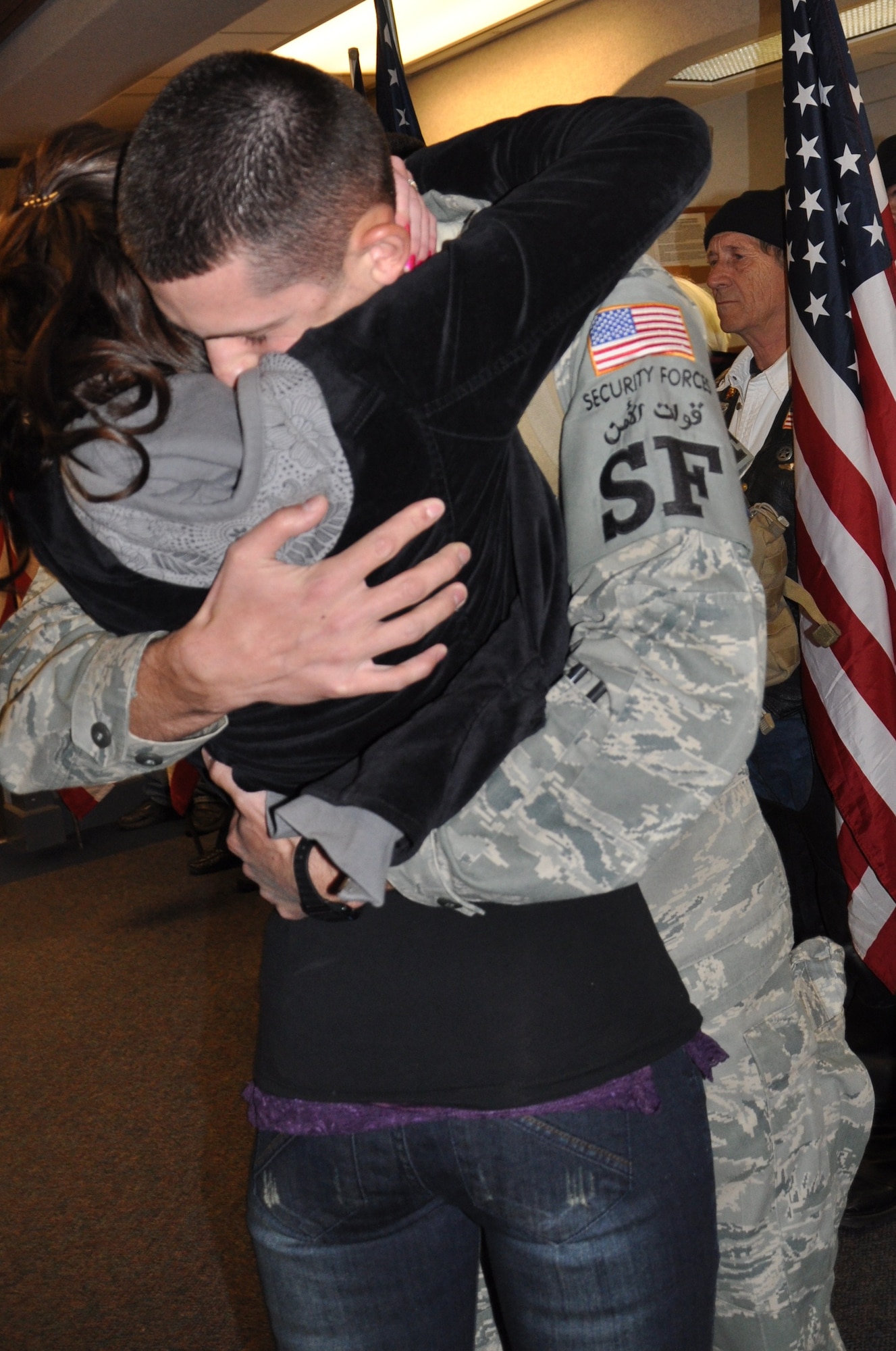 Airman 1st Class Danika Knudson, a friend of returning Airmen, welcomes back Airman 1st Class Keenan Mondragon, 82nd Security Forces Squadron, from his deployment Nov. 25 at the Wichita Fall Municipal Airport. The Airmen were deployed for six months in Southwest Asia. (U.S. Air Force photo/Airman 1st Class Candy Miller)
