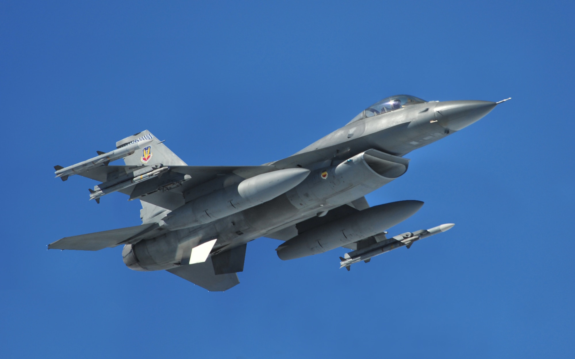 SHAW AIR FORCE BASE, S.C. -- Captain Matthew Feeman, an F-16 alert pilot from Shaw's 55th Fighter Squadron, approaches a Cessna airplane, flown by South Carolina's Civil Air Patrol, to attempt communication, as part of exercise Fertile Keynote Nov.19.  Shaw's alert Airmen work 12 or 48-hour shifts to make sure the mission functions 'round the clock. "Holidays too," said Senior Master Sgt. William Partin, alert NCO-in-charge. "I think if you talk to the folks, you'll find very few who are disgruntled." Airman First Class Andrew Norton doesn't have a problem with it. "Usually on holidays the colonels come by and drop off food," he said. (U.S. Air Force photo/Senior Airman Michael Cowley)