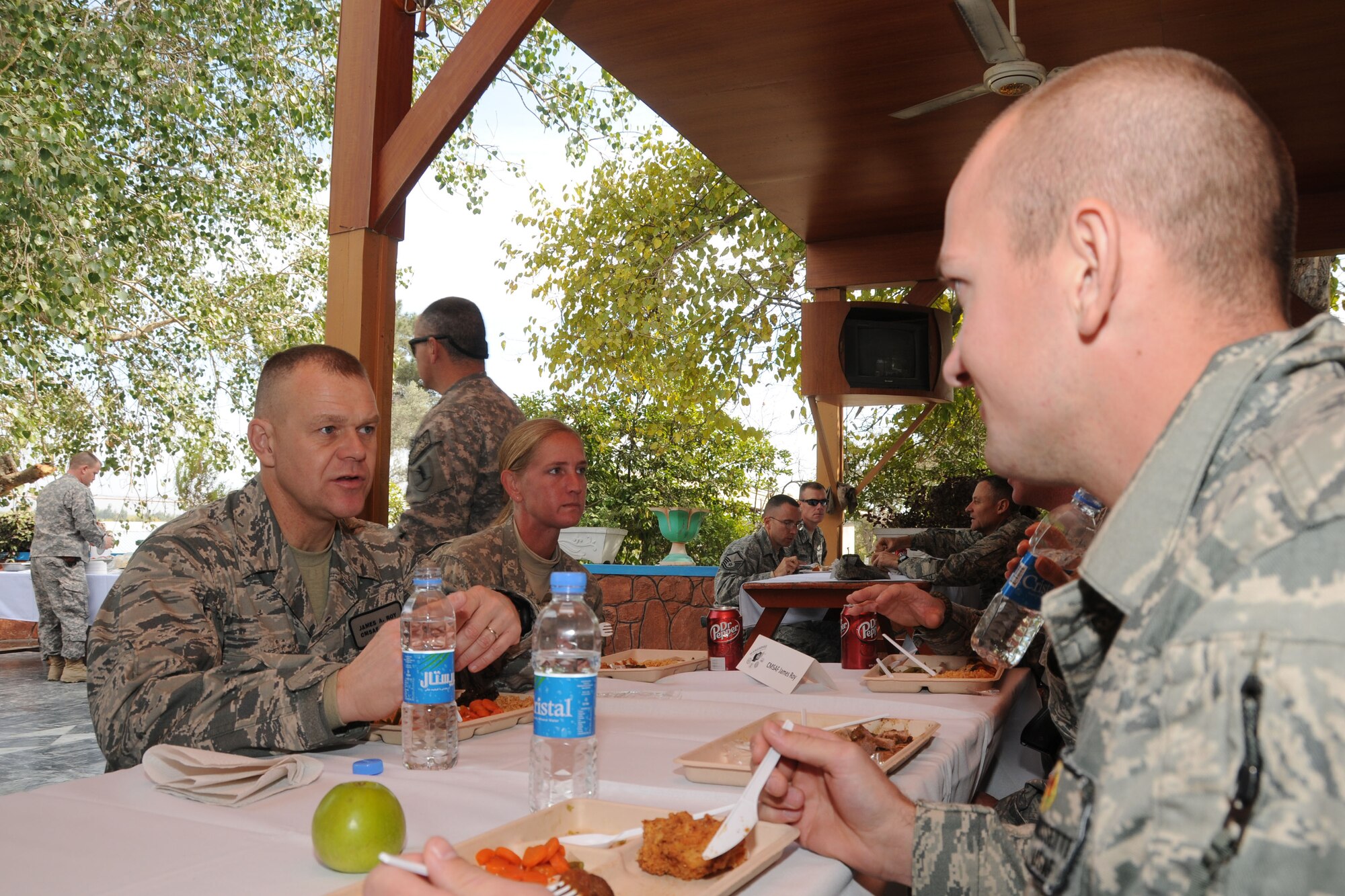 NANGARHAR PROVINCE, Afghanistan -- Chief Master Sgt. of the Air Force James Roy (left), speaks with U.S. Air Force Staff Sgt. Joshua Morrissette (right), 2nd Brigade Embedded Training Team deployed from the 96th Logistics Readiness Squadron at Eglin Air Force Base, Fla., at the Air Force-led Nangahar Provincial Reconstruction Team in Jalalabad, Afghanistan, Nov. 28, 2009.  The CMSAF stopped to see Airmen accomplishing unique jobs associated with the PRT, and learn firsthand how Airmen view their deployment process and what improvements can be made for future Airmen.  (U.S. Air Force photo/Tech. Sgt. Brian Boisvert)