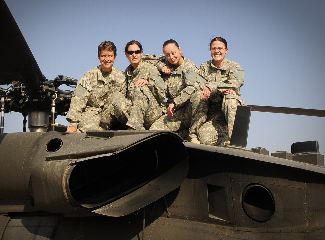 From left, Sgt. Debra Lukan, Capt. Trish Barker, Staff Sgt. Misty Seward and Chief Warrant Officer Andrea Galatian, of the Army’s 3-238th Medevac, C company, became the company's first all-female crew just before Thanksgiving. They are serving in Iraq as part of Task Force Keystone. U.S. Army photo by Sgt. Neil Gussman