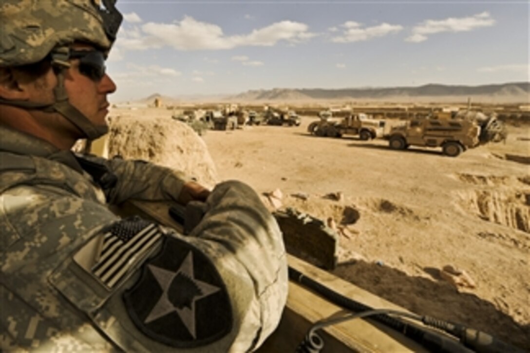 U.S. Army Spc. Brad Mattix, with Charlie Company, 4th Battalion, 23rd Infantry Regiment, 5th Brigade Combat Team, 2nd Infantry Division, provides security at Combat Outpost Sangar, Zabul, Afghanistan, on Nov. 22, 2009.  