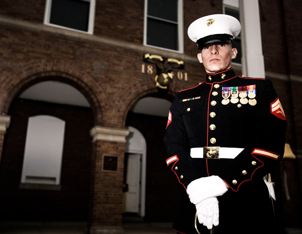Cpl. Javier Hinojosa stands at ceremonial at ease on the parade grounds of Marine Barracks Washington, Nov. 30. As a ceremonial marcher, Hinojosa must master a new set of drills and cadences unique to the Barracks.