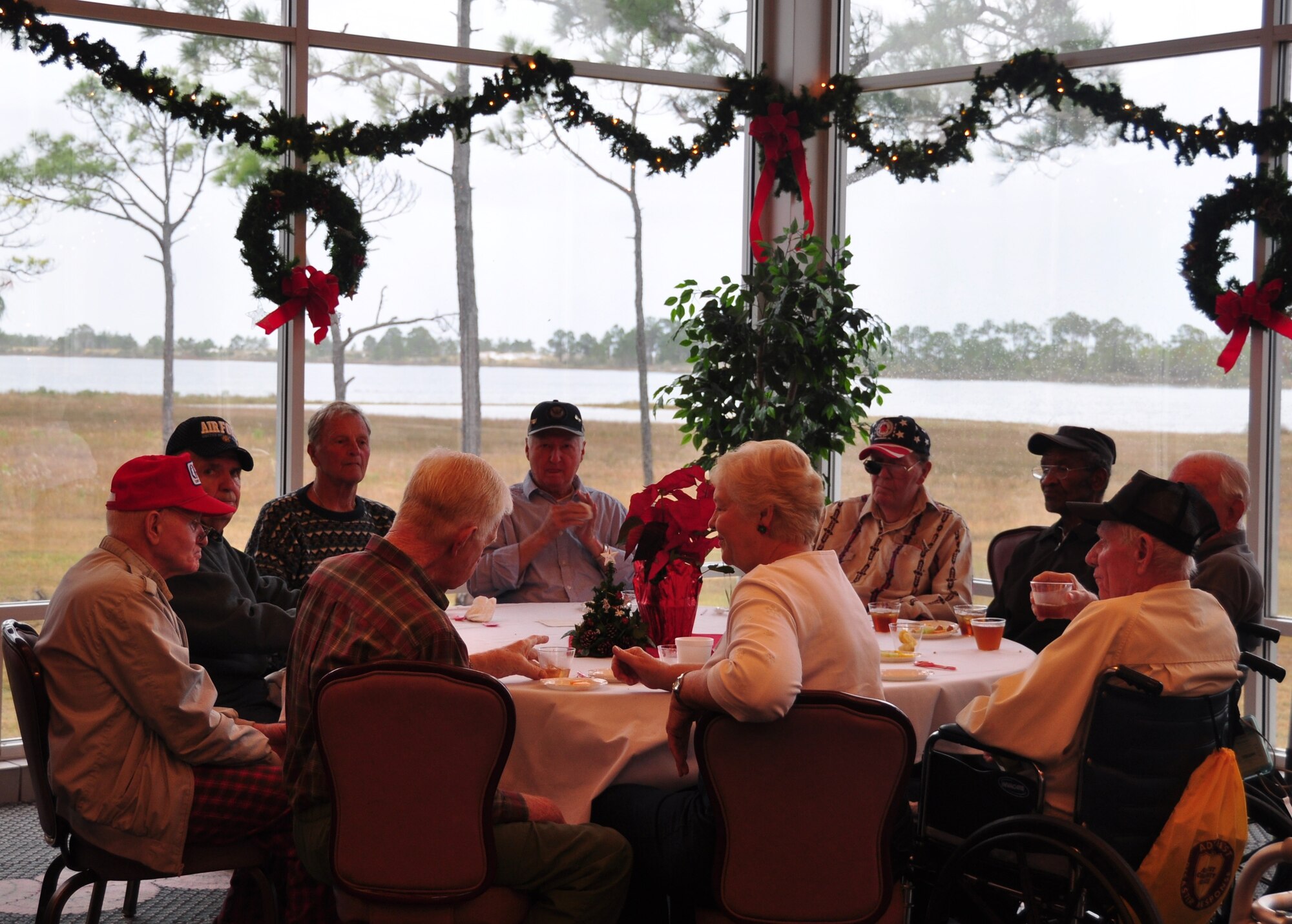 Tyndall Air Force Base's Chiefs Group hosted local senior citizens from Bay County Dec. 2 at the Heritage Club for the 23st annual Golden Age Christmas party. (U.S. Air Force Photo by Airman 1st Class Rachelle Elsea)
