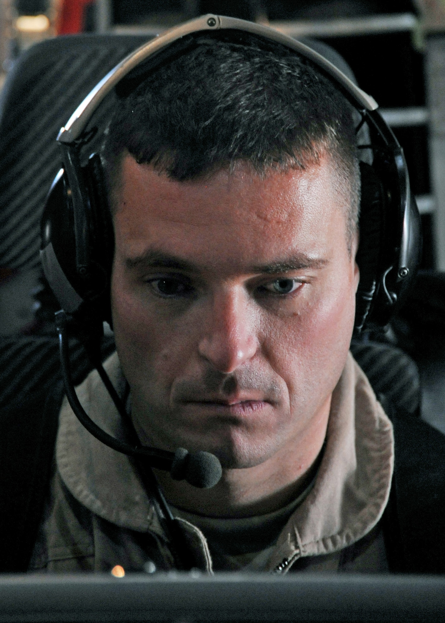 Capt. Jason Davis prepares for a joint airborne battle staff detachment mission on a C-130 Hercules Nov. 24, 2009. The JABS is a joint operation focused on providing airborne communications support to ground forces. Captain Davis is the 777th Expeditionary Airlift Squadron mission commander. (U.S. Air Force photo/Senior Airman Christopher Hubenthal)