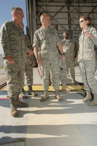 Lt. Gen. Robert Allardice, left, and Chief Master Sgt. James Cody, center, speak with Maj. Sara Huiss, right, during their tour of the Home Station Check Hangar here Dec. 1. General Allardice visited Charleston AFB during a two-day tour after assuming command of the 18th Air Force Aug. 19, 2009. General Allardice is the 18th Air Force commander and Chief Cody is the 18th Air Force command chief. Major Huiss is the 437th Maintenance Squadron commander.  (U.S. Air Force photo/Airman 1st Class Lauren Laidlaw)