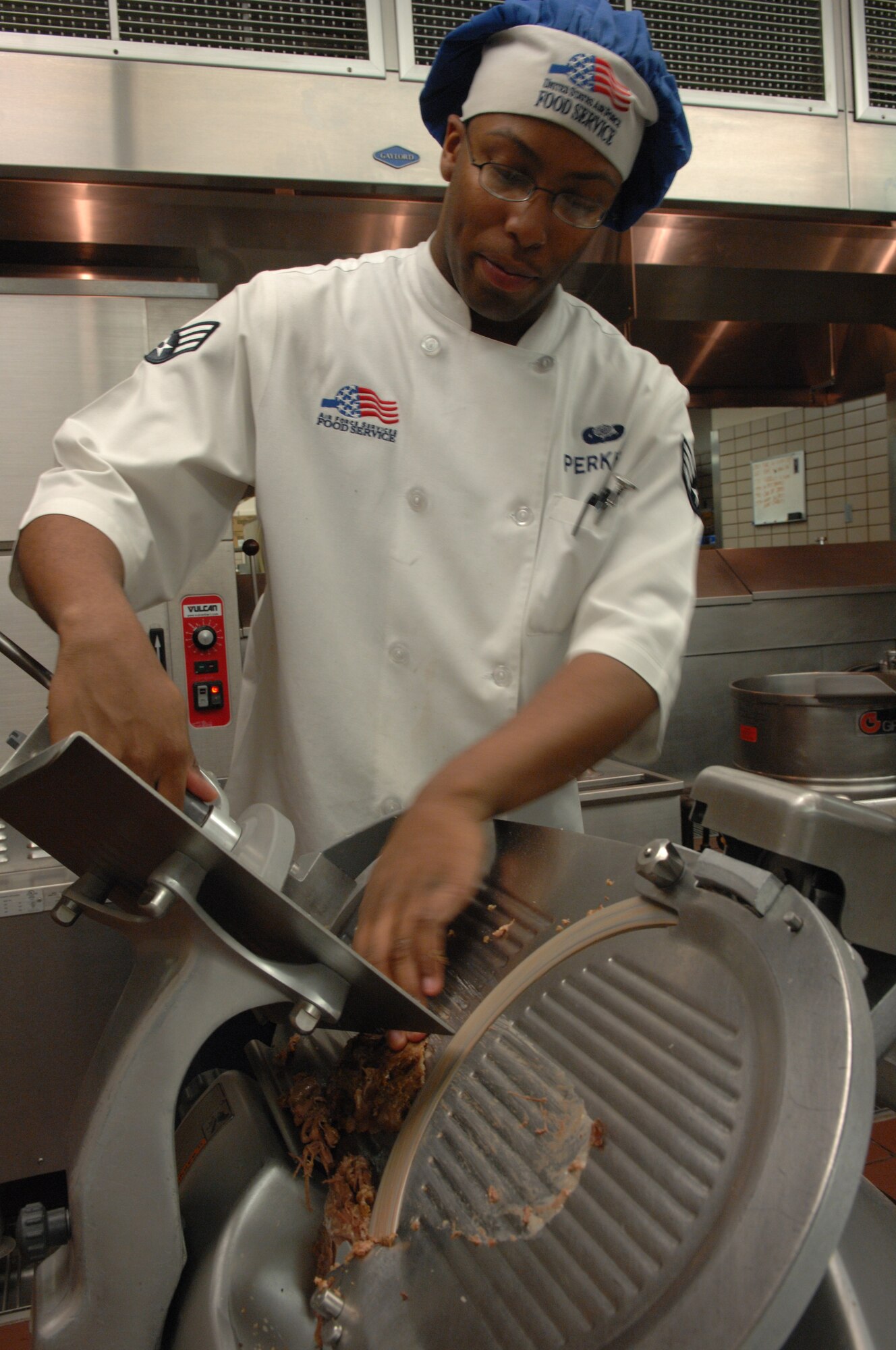 Senior Airman Patrick Perkins prepares sauerbraten Nov. 25, 2009, Eielson Air Force Base, Alaska. Food services Airmen are responsible for preparing and cooking meals for hundreds of Airmen everyday. Airman Perkins is assigned to the 354th Force Support Squadron food service Airman. (U.S. Air Force photo/Airman 1st Class Rachelle Coleman)
