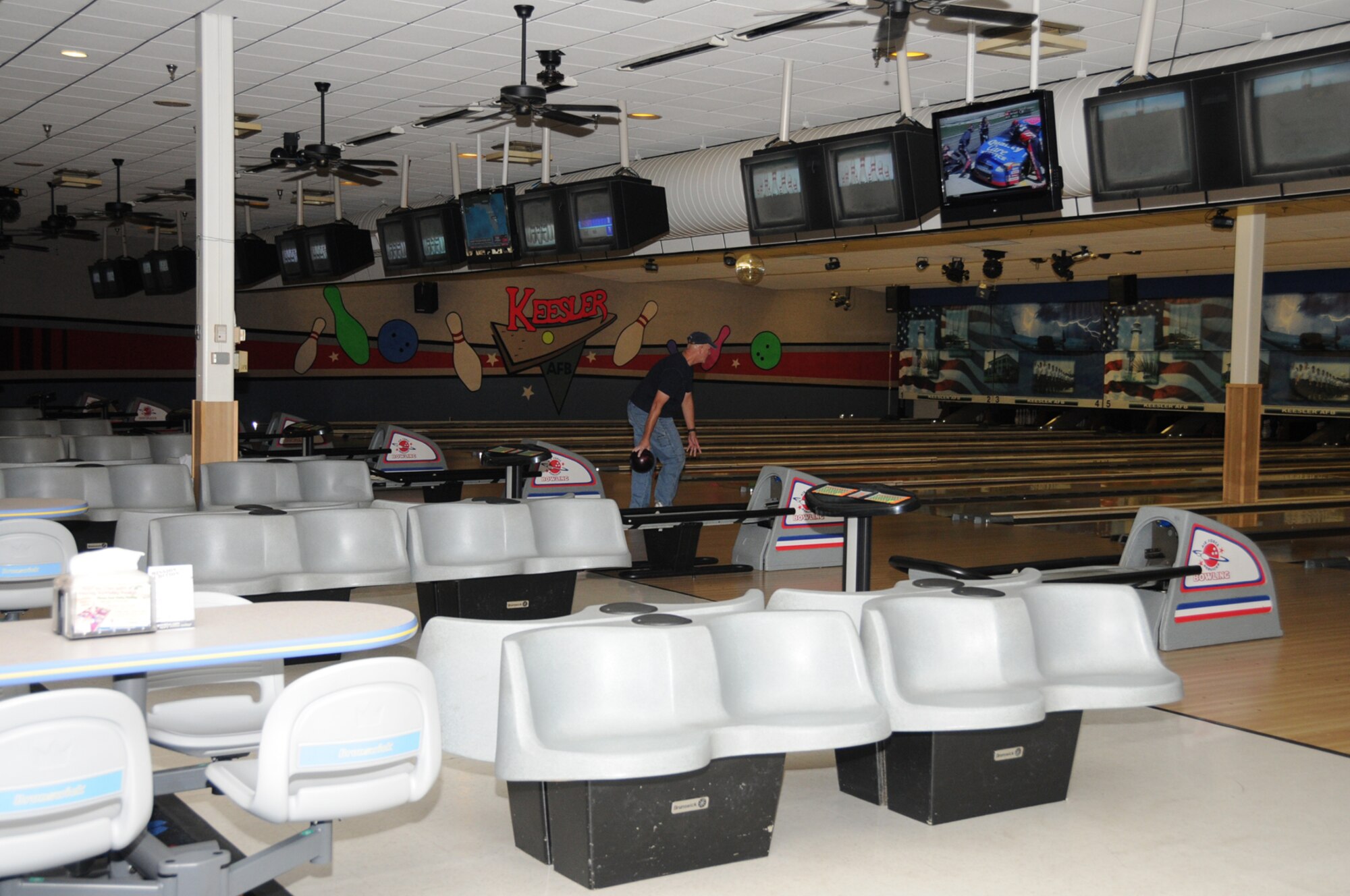 Edward Goodnite enjoys his first day of retirement at the newly-renovated Gaudé Lanes.  (U.S. Air Force photo by Kemberly Groue)