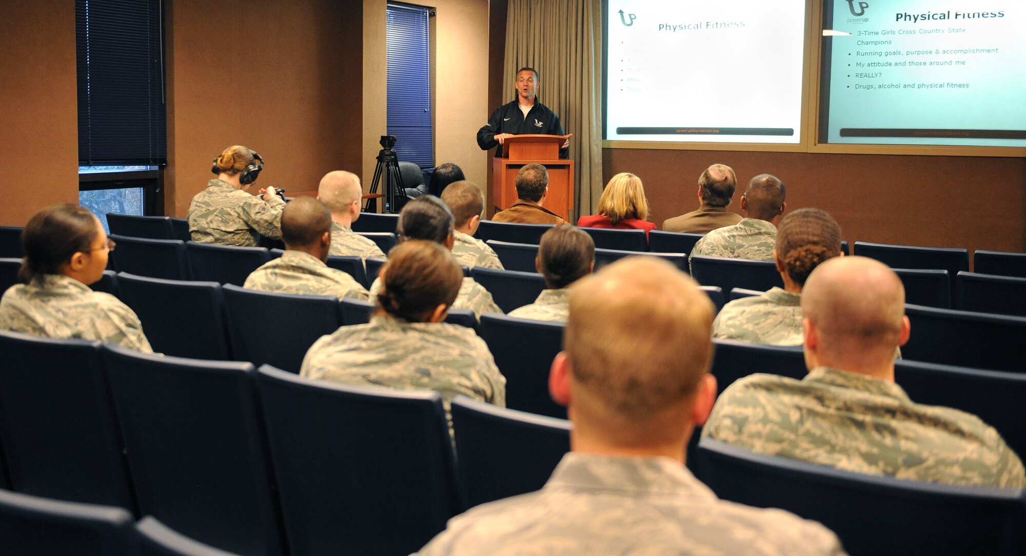 LANGLEY AIR FORCE BASE, Va. -- Coach Doug Merrill, ultra-marathon runner and author of "Fighting the Demons of Suicide," speaks to Langley Airmen Dec. 1 about achieving positive mental health through physical fitness. As a motivational speaker, Coach Merrill encourages young adults to stay active, achieve goals, and watch for suicidal symptoms in friends and family members. (U.S. Air Force photo/Airman 1st Class Gul Crockett) 