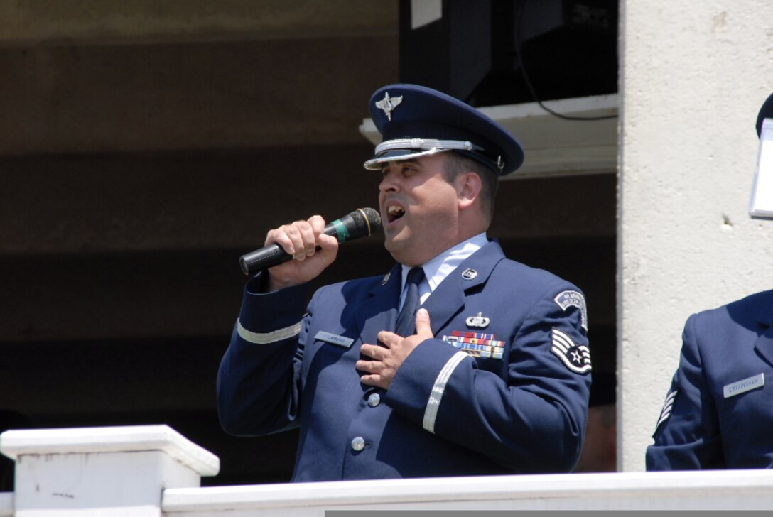 Staff Sergeant Matthew Holmberg performs with the ANG Band of the Mid-Atlantic at Pocono Raceway, Long Pond PA on 3 Aug 2009 for the Pennsylvania 500.