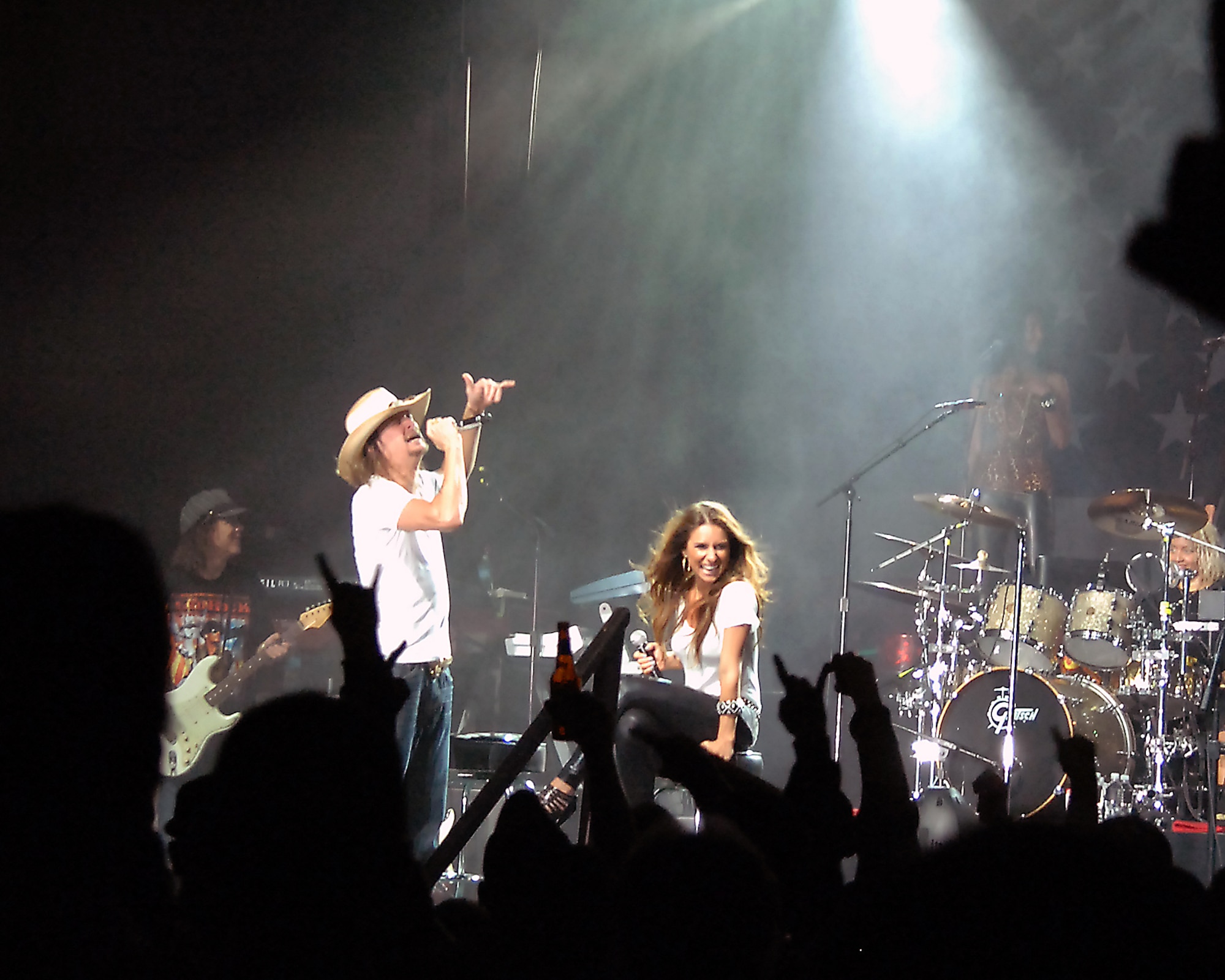 Kid Rock and singer/songwriter Jessie James performs at the Tour for the Troops concert Tuesday Dec. 1, 2009, inside Hangar 4 at Incirlik Air Base, Turkey. Kid Rock and the Twisted Brown Truck Band, singer/songwriter Jessie James and comedian Carlos Mencia kicked off the tour making Incirlik their first stop to thank the troops. The three entertainers also visited various places around the base including the 39th Security Forces Squadron, Incirlik’s American Forces Network studio and the 39th Force Support Squadron. (U.S. Air Force photo/Staff Sgt. Lauren Padden)