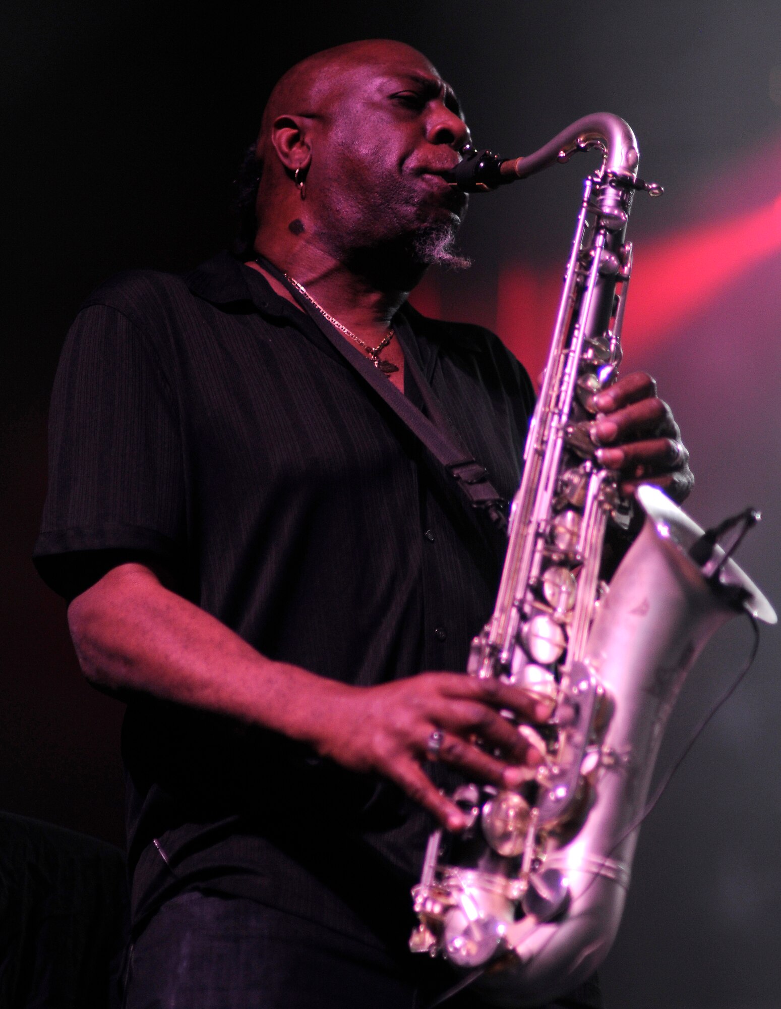 David McMurray, Twisted Brown Truck Band saxophone, performs with Kid Rock at the Tour for the Troops concert Tuesday Dec. 1, 2009, inside Hangar 4 at Incirlik Air Base, Turkey. Kid Rock and the Twisted Brown Truck Band, singer/songwriter Jessie James and comedian Carlos Mencia kicked off the tour making Incirlik their first stop to thank the troops. The three entertainers also visited various places around the base including the 39th Security Forces Squadron, Incirlik’s American Forces Network studio and the 39th Force Support Squadron. (U.S. Air Force photo/Airman 1st Class Amber Ashcraft)