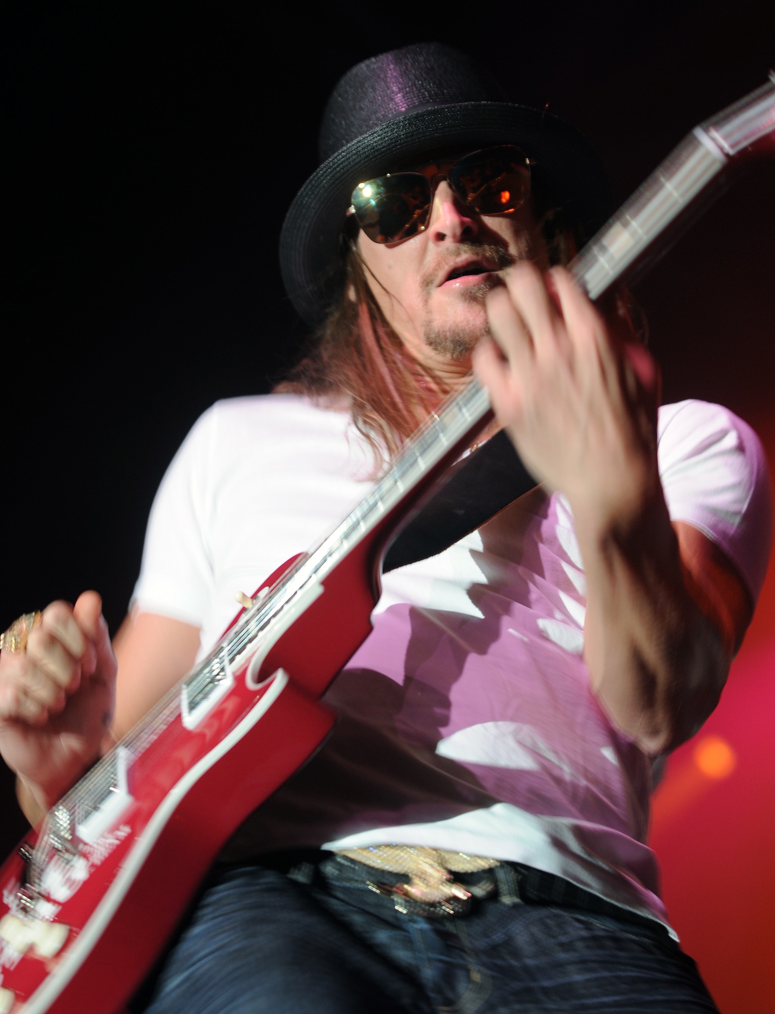 Kid Rock performs at the Tour for the Troops concert Tuesday Dec. 1, 2009, inside Hangar 4 at Incirlik Air Base, Turkey. Kid Rock and the Twisted Brown Truck Band, singer/songwriter Jessie James and comedian Carlos Mencia kicked off the tour making Incirlik their first stop to thank the troops. The three entertainers also visited various places around the base including the 39th Security Forces Squadron, Incirlik’s American Forces Network studio and the 39th Force Support Squadron. (U.S. Air Force photo by/ Senior Airman Sara Csurilla)