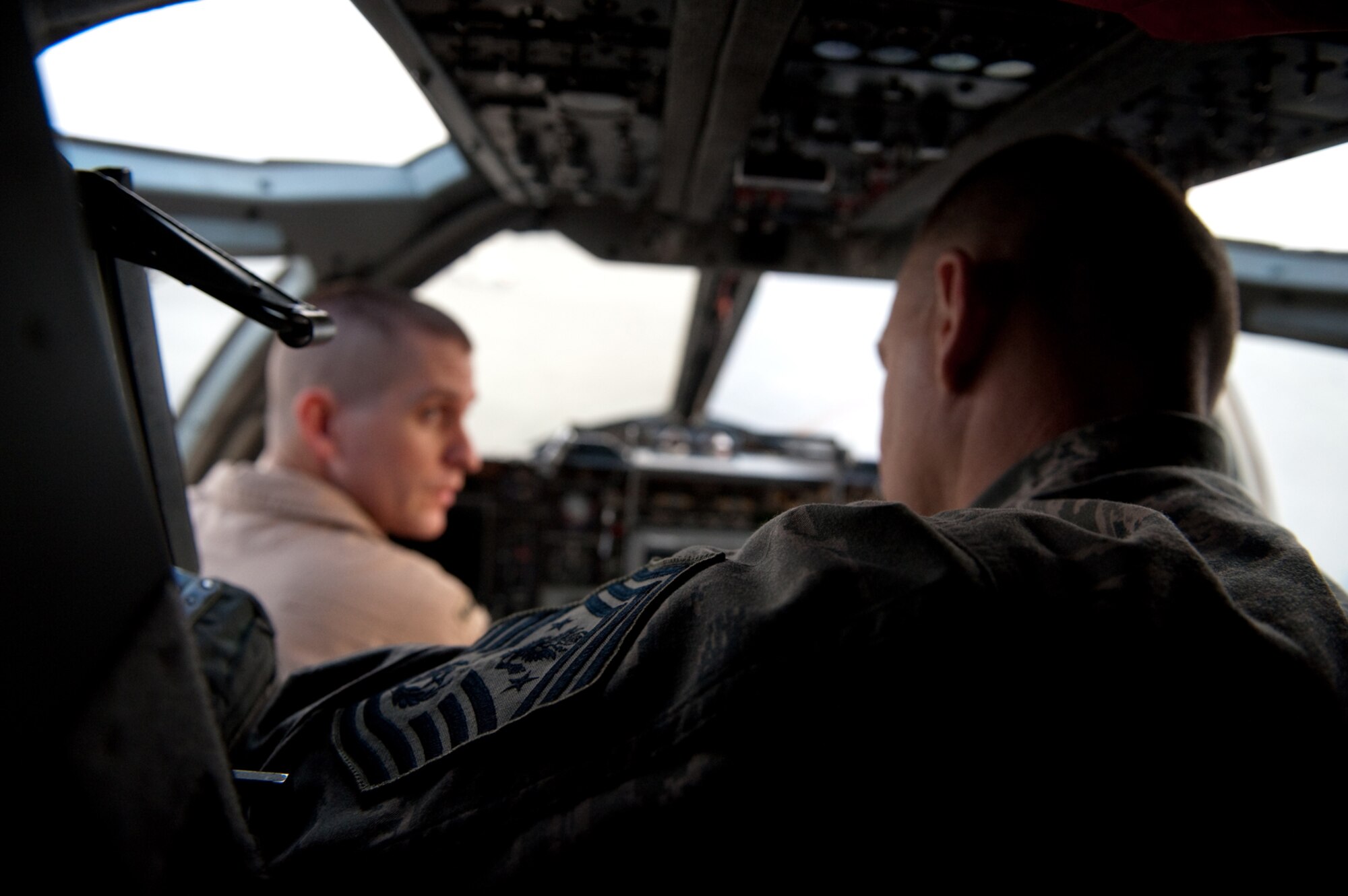 Chief Master Sgt. of the Air Force James A. Roy receives a tour of the B-1B Lancer cockpit from 1st Lt. Ryan Teak, 37th Expeditionary Bomb Squadron, Nov. 30, 2009. Chief Roy is touring the U.S. Air Forces Central Command area of responsibility, visiting with Airmen and addressing numerous issues affecting service members who are deployed in support of operations Iraqi Freedom and Enduring Freedom. (U.S. Air Force photo/Staff Sgt. Robert Barney)