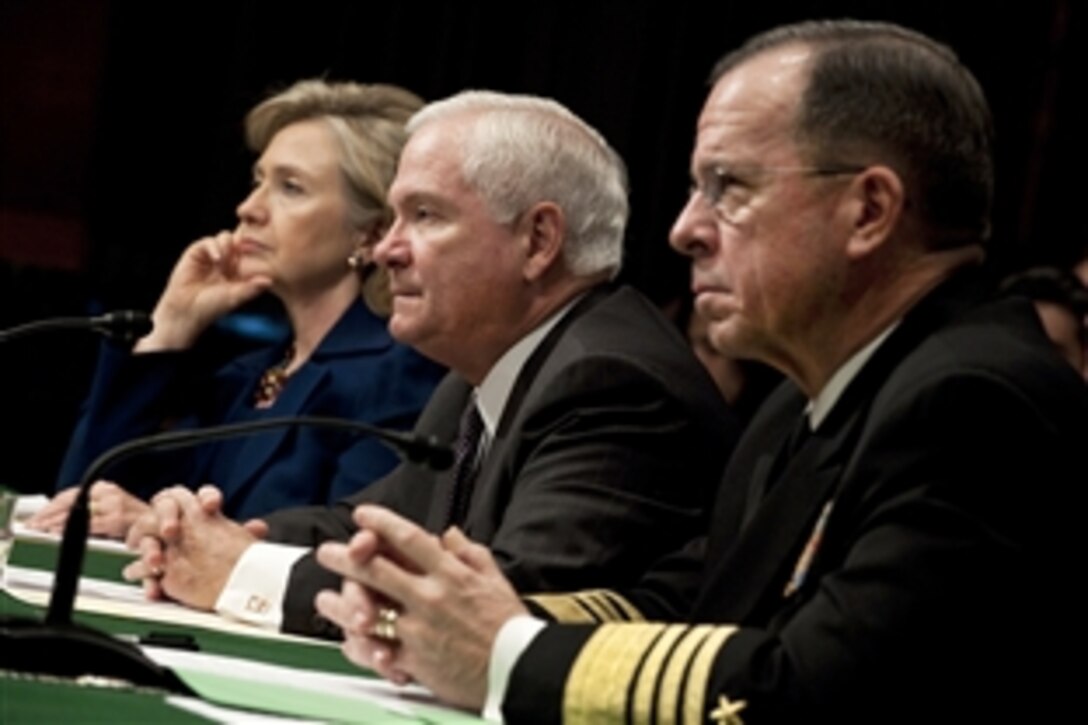 Secretary of State Hillary Rodham Clinton, Defense Secretary Robert M. Gates and Navy Adm. Mike Mullen, chairman of the Joint Chiefs of Staff, testify before the Senate Armed Services Committee at the Dirksen Senate Office Building in Washington, D.C., Dec. 2, 2009. The testimony focused on President Barack Obama's decision to send an additional 30,000 troops to the war in Afghanistan.