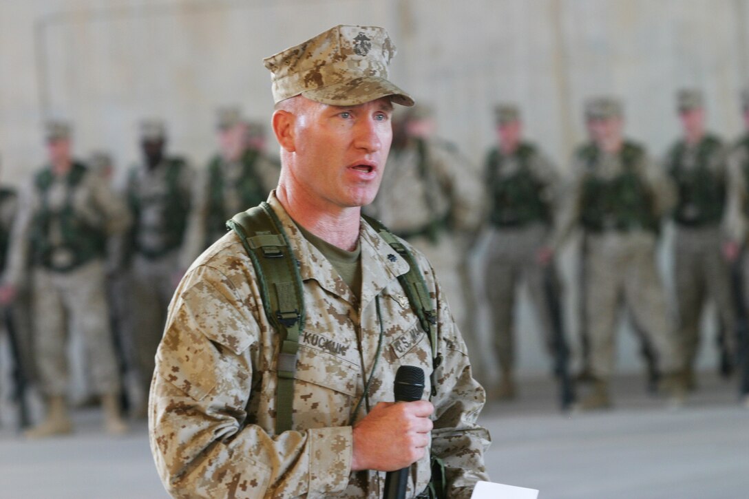 Lieutenant Colonel Robert Kuckuk, commanding officer, Marine Attack Squadron 311 speaks at his change of command ceremony, Feb. 28. Kuckuk takes command of a squadron who is three months into a six month deployment  in Iraq.