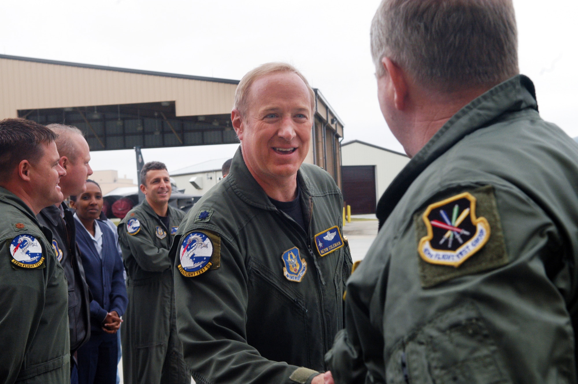 Lt. Col. Kevin Coleman is congratulated by co-workers after his final flight Nov. 23. U. S. Air Force photo by Sue Sapp