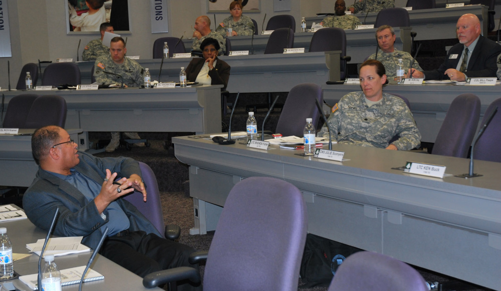 SCOTT AIR FORCE BASE, Ill -- Michael K. Williams, deputy to the commander of Military Surface Deployment and Distribution Command, talks with surface transportation experts during SDDC's annual Commanders' Conference. (Photo courtesy/ Mike Petersen) 