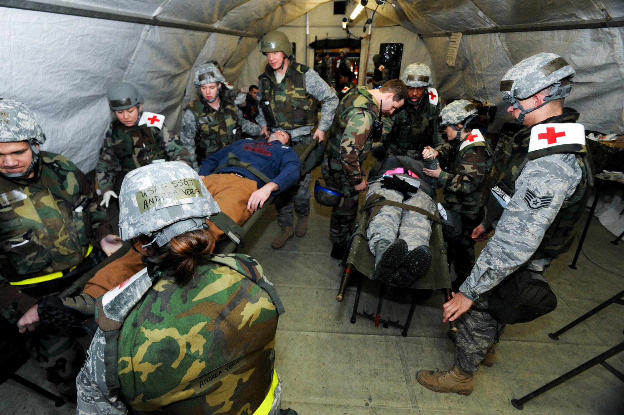 ELMENDORF AIR FORCE BASE, Alaska -- Members of the 3rd Medical Group tend to victims during a mass casualty inject for the base wide exercise, Polar Force 10-1 Dec. 3. The exercise is amde up of a variety of scenarios that test the Arctic Warriors ability to handle real world situations. (U.S. Air Force photo/ Staff Sgt. Joshua Garcia)

