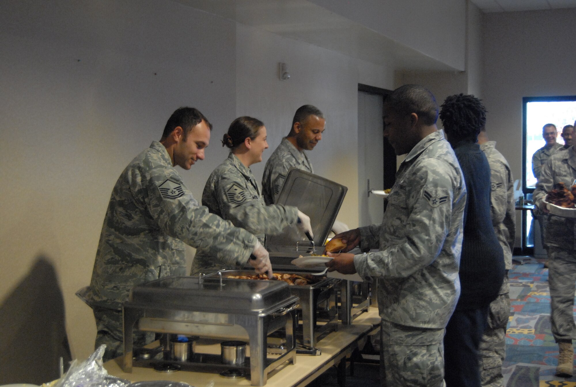 Pope’s first sergeants gathered at the Pope Community Center Nov. 24 to fry up a Thanksgiving feast for the dorm residents. (photos by Rhonda Grifin)