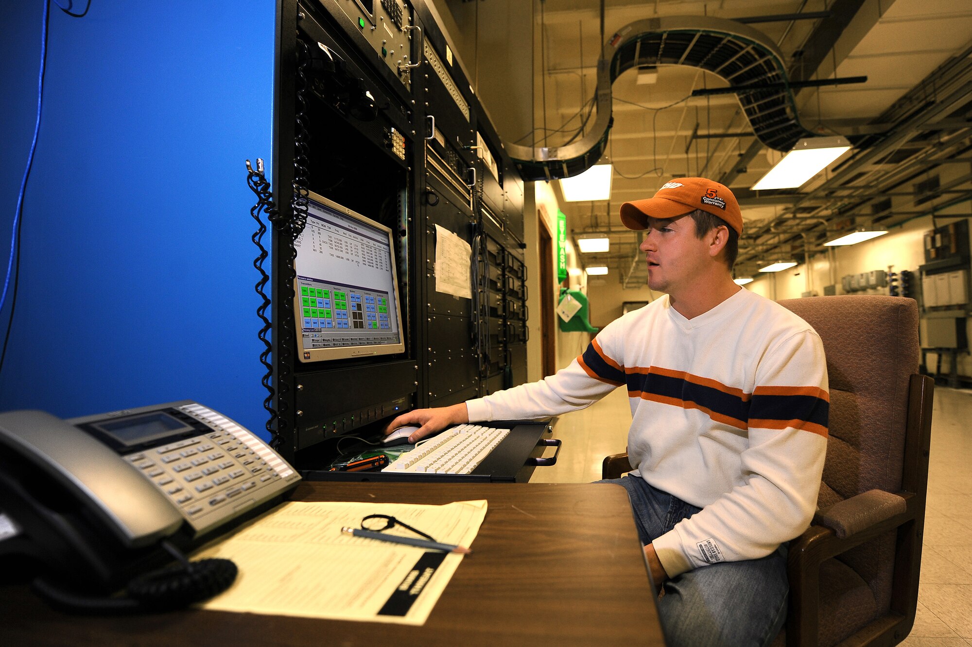 Brady Bach monitors the antennas at the Elkhorn and Scribner Communication sites Nov. 5, 2009, from a detached facility located near Elkhorn, Neb. Mr. Bach is a telecommunications specialist with the 55th Strategic Communications Squadron from Offutt Air Force Base, Neb. (U.S. Air Force photo/Josh Plueger)