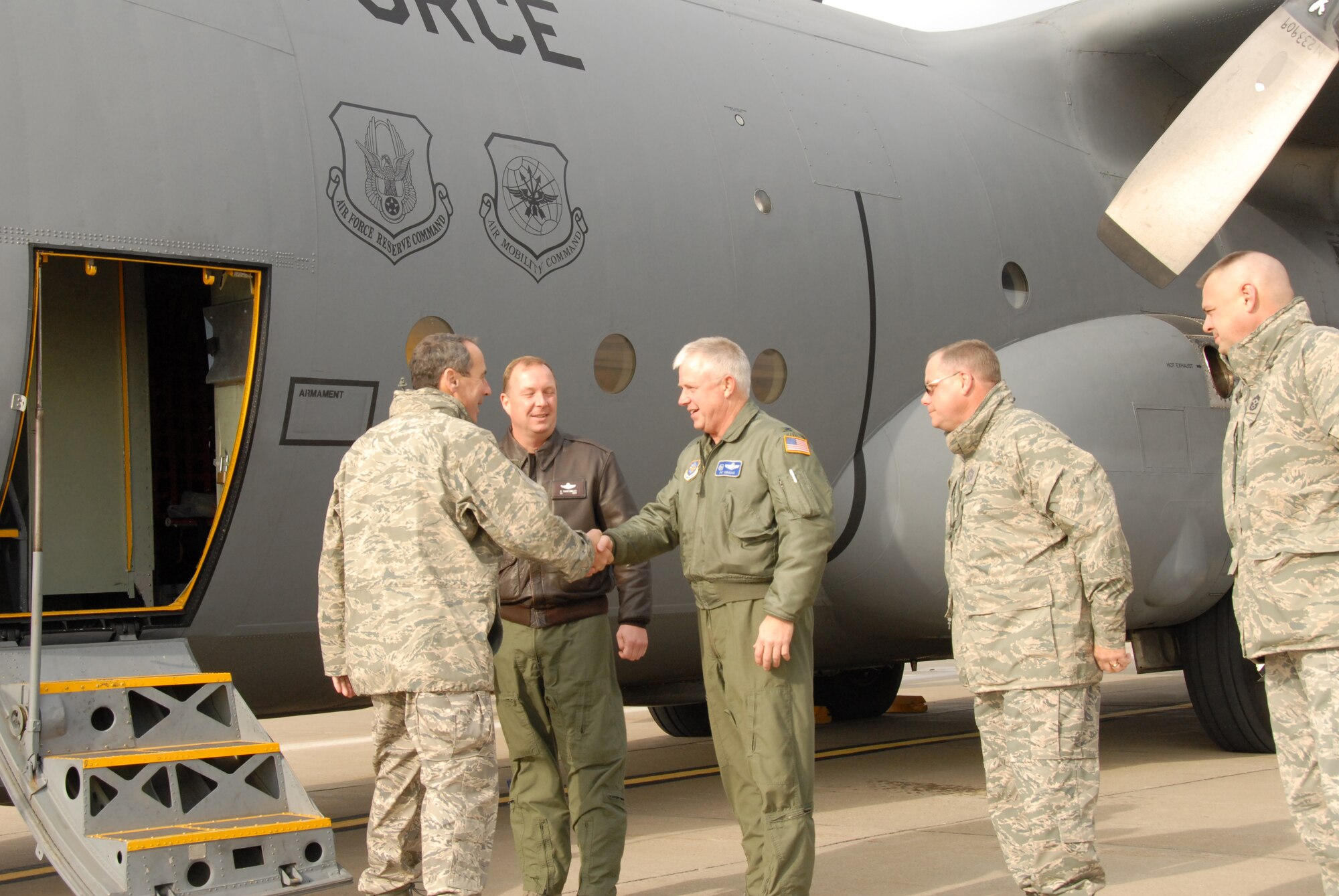 The new Air Mobility Commander, Gen. Raymond Johns, Jr. is greeted by the commanders of the Niagara Falls Air Reserve Station. Niagara was one of the numerous stop the general has made during his tour of Air Force Bases under his command.  Above: Col. Patrick Ginavan, 107th AW, Commander, welcomes the general to Niagara. To the left of the colonel is Col. Allan Swartzmiller, 914th AW, Commander, to the right is Chief Master Sgt. Scott Scharlau, 914th AW, Command Chief and Chief Master Sgt. Richard King, 107th AW, Command Chief. (U.S. Air Force Photo/Senior Master Sgt. Ray Lloyd) 