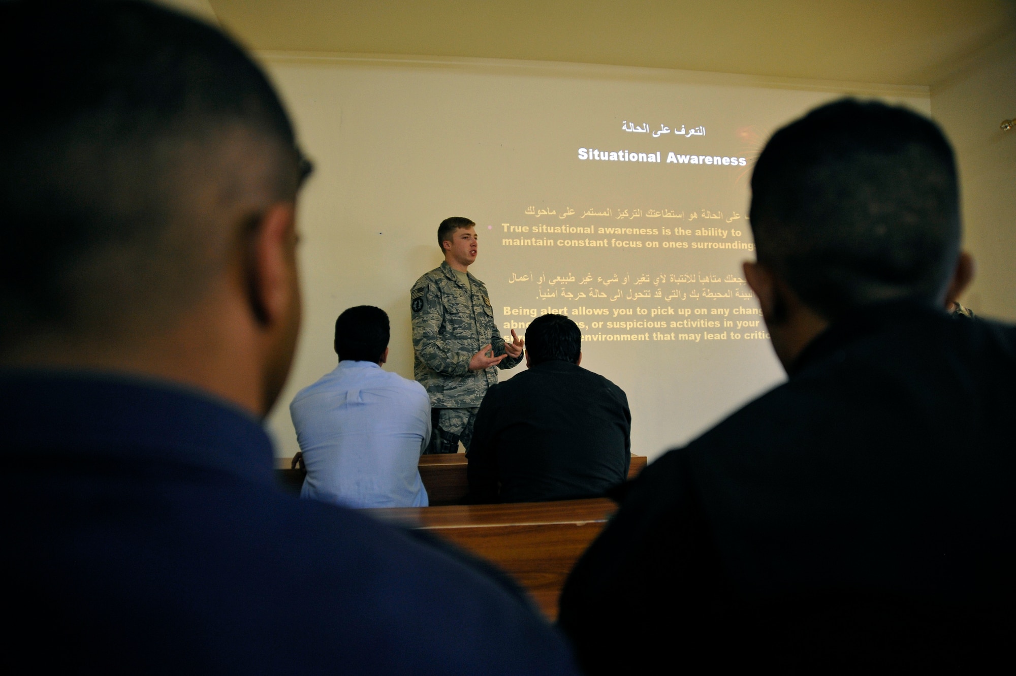 Staff Sgt. Michael Gomez instructs a class of Iraqi police officers about using situational awareness Nov. 18, 2009, in Baghdad, Iraq. Sergeant Gomez is assigned to the 732nd Expeditionary Security Forces Squadron Det. 2. (U.S. Air Force photo/Staff Sgt. Angelita Lawrence)
