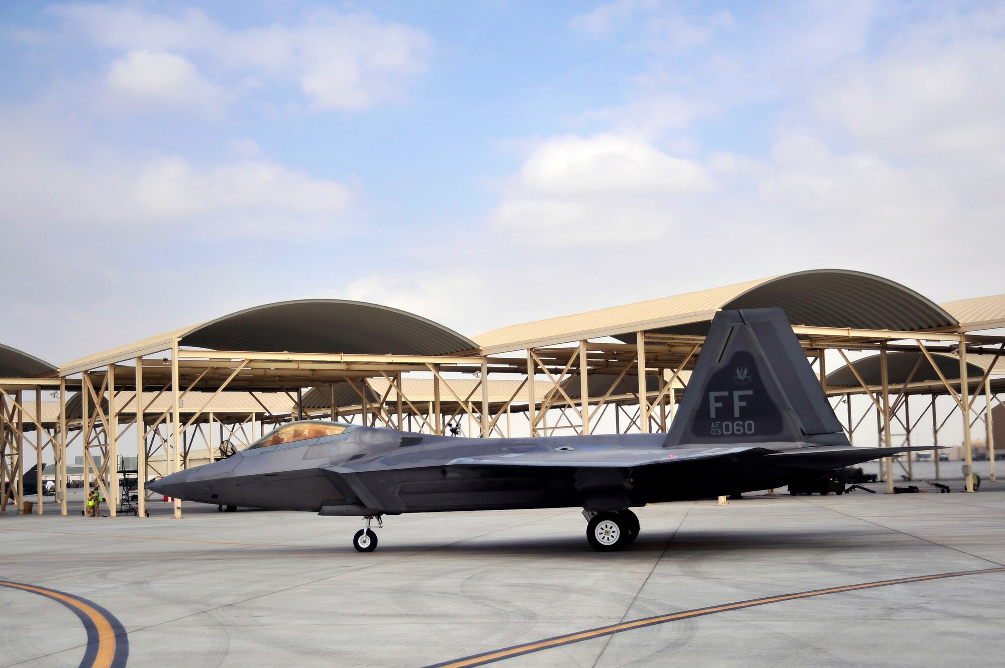 UNITED ARAB EMIRATES AIR WARFARE CENTER, UAE - Capt. Matthew Howard, 1st Fighter Wing pilot taxis an F-22 Raptor to the runway for take-off Nov. 30, 2009. Captain Howard hails from Warrensburg, Mo. F-22 Raptors have deployed from the 1st Fighter Wing at Langley AFB, VA to the United Arab Emirates Air Warfare Center.  Aircrews have been participating in bilateral training opportunities with Coalition partners.  The exercises are designed to promote security, stability and mutual interests in the region. (U.S. Air Force photo/Tech. Sgt. Charles Larkin Sr)