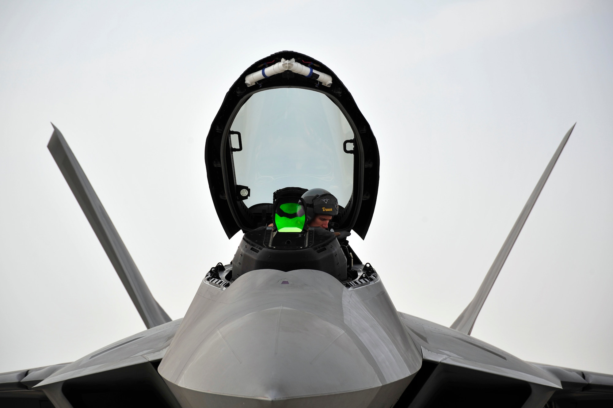 UNITED ARAB EMIRATES AIR WARFARE CENTER, UAE - Capt. Blaine Jones, 1st Fighter Wing pilot, checks the cockpit of an F-22 Raptor before closing the canopy Nov. 30, 2009. Captain Jones is on temporary duty from Langley Air Force Base, Va. Captain Howard hails from Kingman, Kan. F-22 Raptors have deployed from the 1st Fighter Wing at Langley AFB, VA to the United Arab Emirates Air Warfare Center.  Aircrews have been participating in bilateral training opportunities with Coalition partners.  The exercises are designed to promote security, stability and mutual interests in the region.  (U.S. Air Force photo/Tech. Sgt. Charles Larkin Sr)