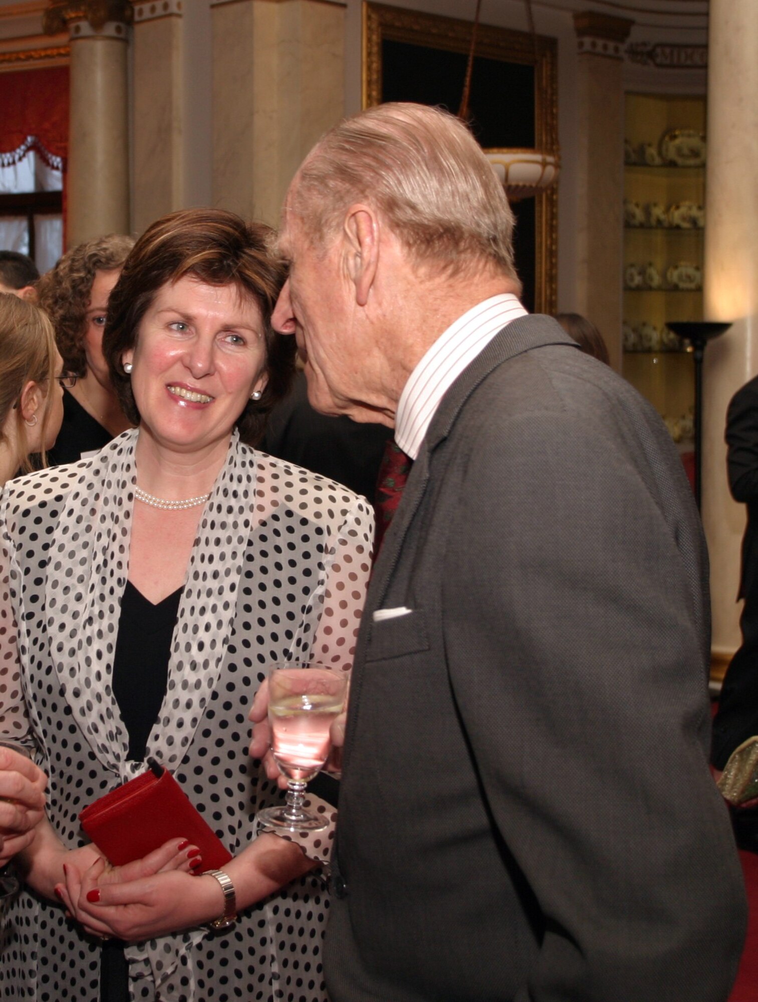 Sheila Bailey, RAF Mildenhall’s British-American Community Relations Committee chairman, meets with Prince Philip, the Duke of Edinburgh, during an event at Buckingham Palace. As part of her duties as BAC chairman, Mrs. Bailey networks with community members and governmental officials to spread Team Mildenhall’s positive messages throughout the community. (Courtesy photo)