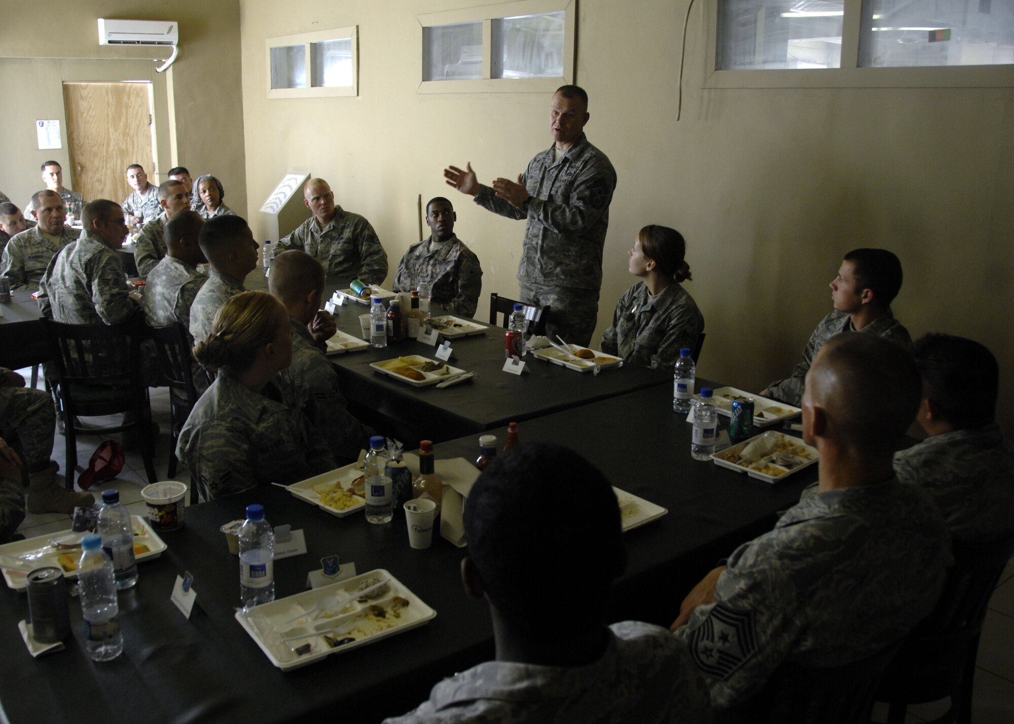 KANDAHAR AIRFIELD, Afghanistan - Chief Master Sergeant of the Air Force James Roy speaks to Airmen explaining how experiences in a combat environment will benefit them in their future careers Nov. 30, 2009.  Chief Roy also took time after the luncheon to answer Airmen's questions about current events and future plans for the Air Force. (U.S. Air Force photo/Senior Airman Timothy Taylor)