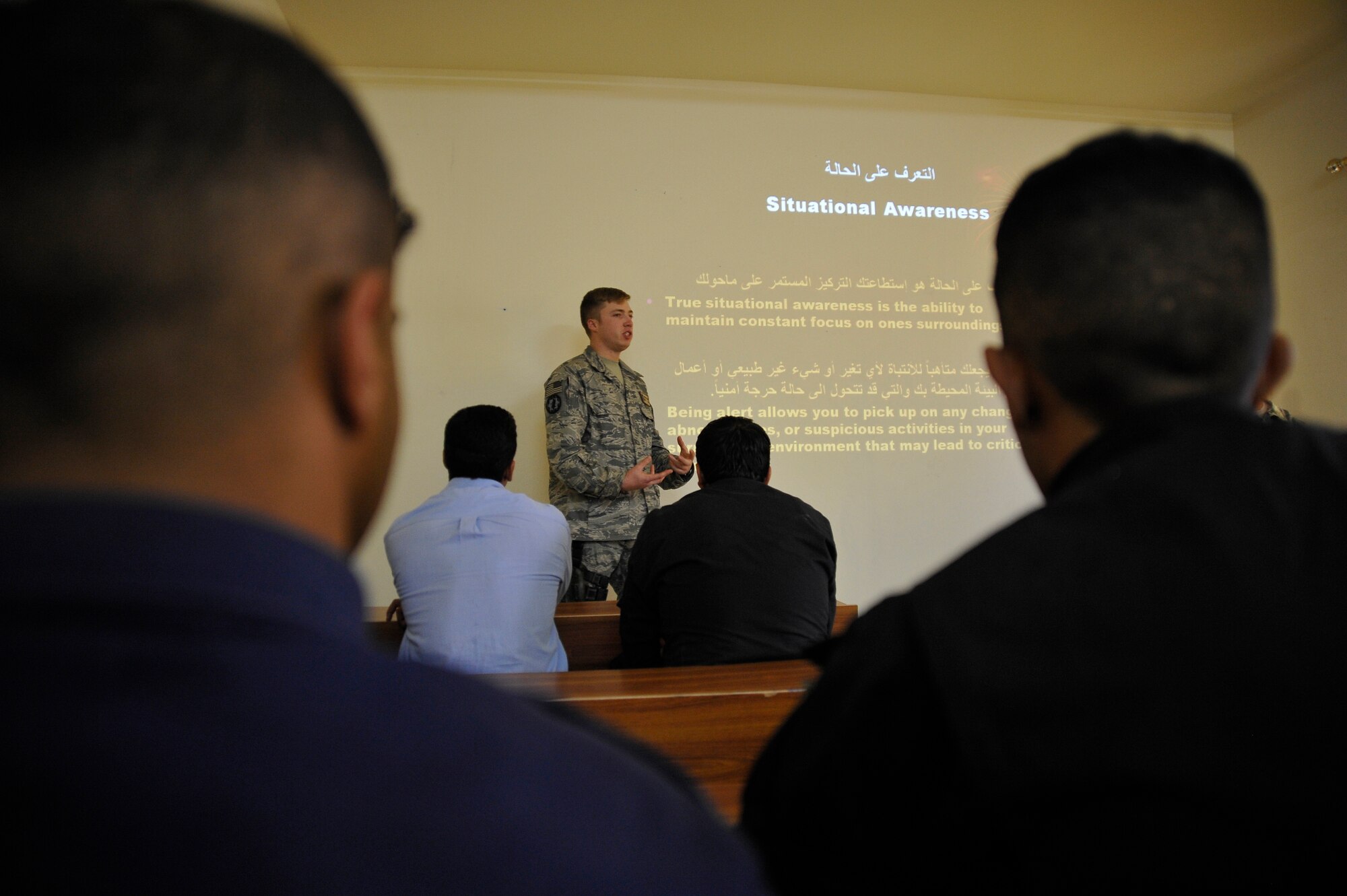 U.S. Air Force Staff Sgt. Michael Gomez, 732nd Expeditionary Security Forces Squadron Det. 2 Defender, deployed to Baghdad, Iraq, instructs a class of Iraqi Police officers about using situational awareness, Nov. 18, 2009. (U.S. Air Force photo/Staff Sgt. Angelita Lawrence)
