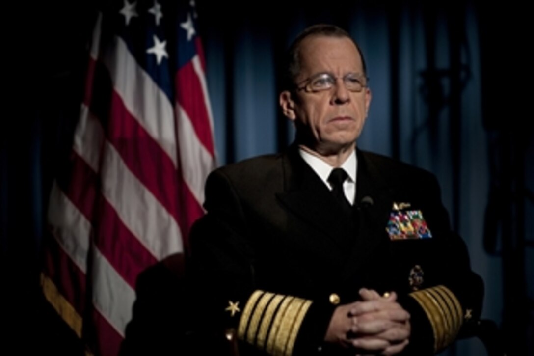Chairman of the Joint Chiefs of Staff Adm. Mike Mullen, U.S. Navy, prepares to answer questions from morning news show reporters regarding his congressional testimony on President Obama’s announcement to send additional troops to Afghanistan in the Pentagon on Dec. 3, 2009.  