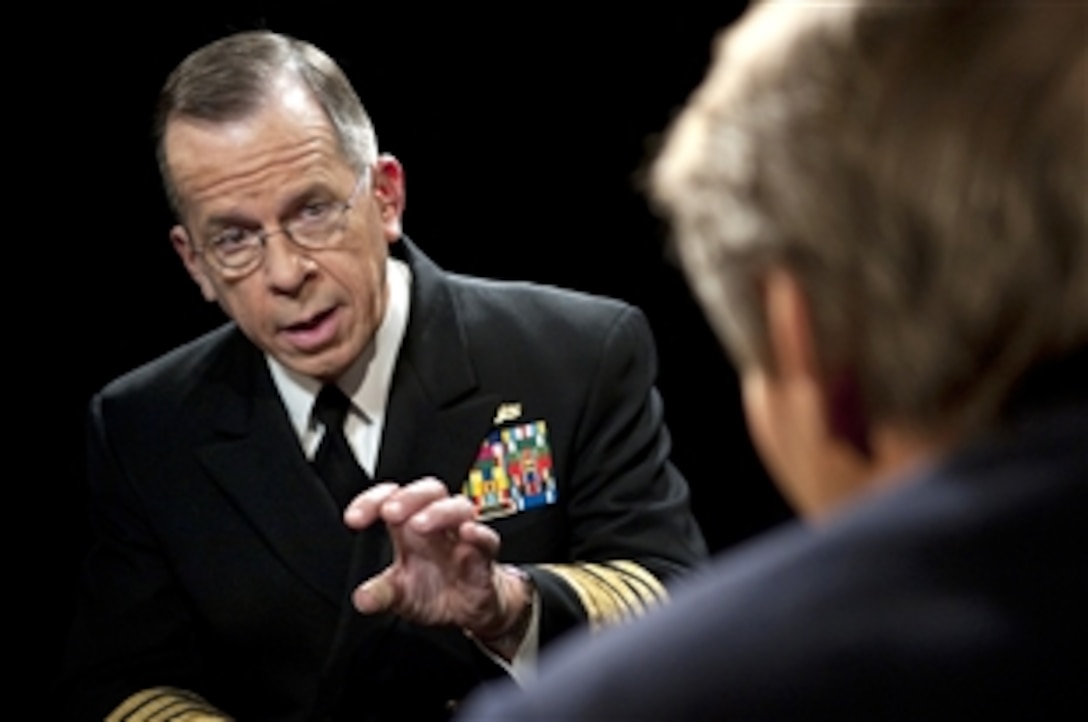 Charlie Rose interviews U.S. Navy Adm. Mike Mullen, chairman of the Joint Chiefs of Staff, during a taping of the Charlie Rose Show in Washington, D.C., Dec. 2, 2009. Mullen answered questions regarding his congressional testimony on President Barack Obama's decision to send 30,000 additional troops to support the war in Afghanistan. 