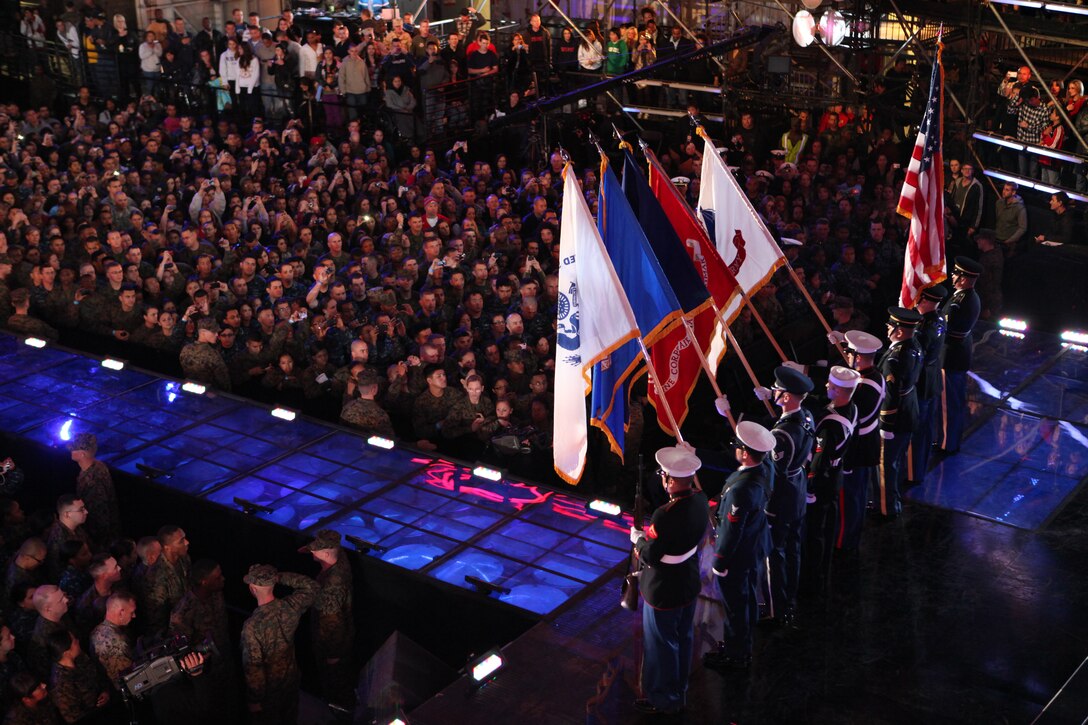 A joint-force color guard opens the 2010 VH1 Divas Salute the Troops concert at Marine Corps Air Station Miramar, Calif., Dec. 3. Approximately 27,000 people attended the concert hosted by Kathy Griffin, which featured Katy Perry, Nicki Minaj, Sugarland, Grace Potter and the Nocturnals and a special appearance by Heart.